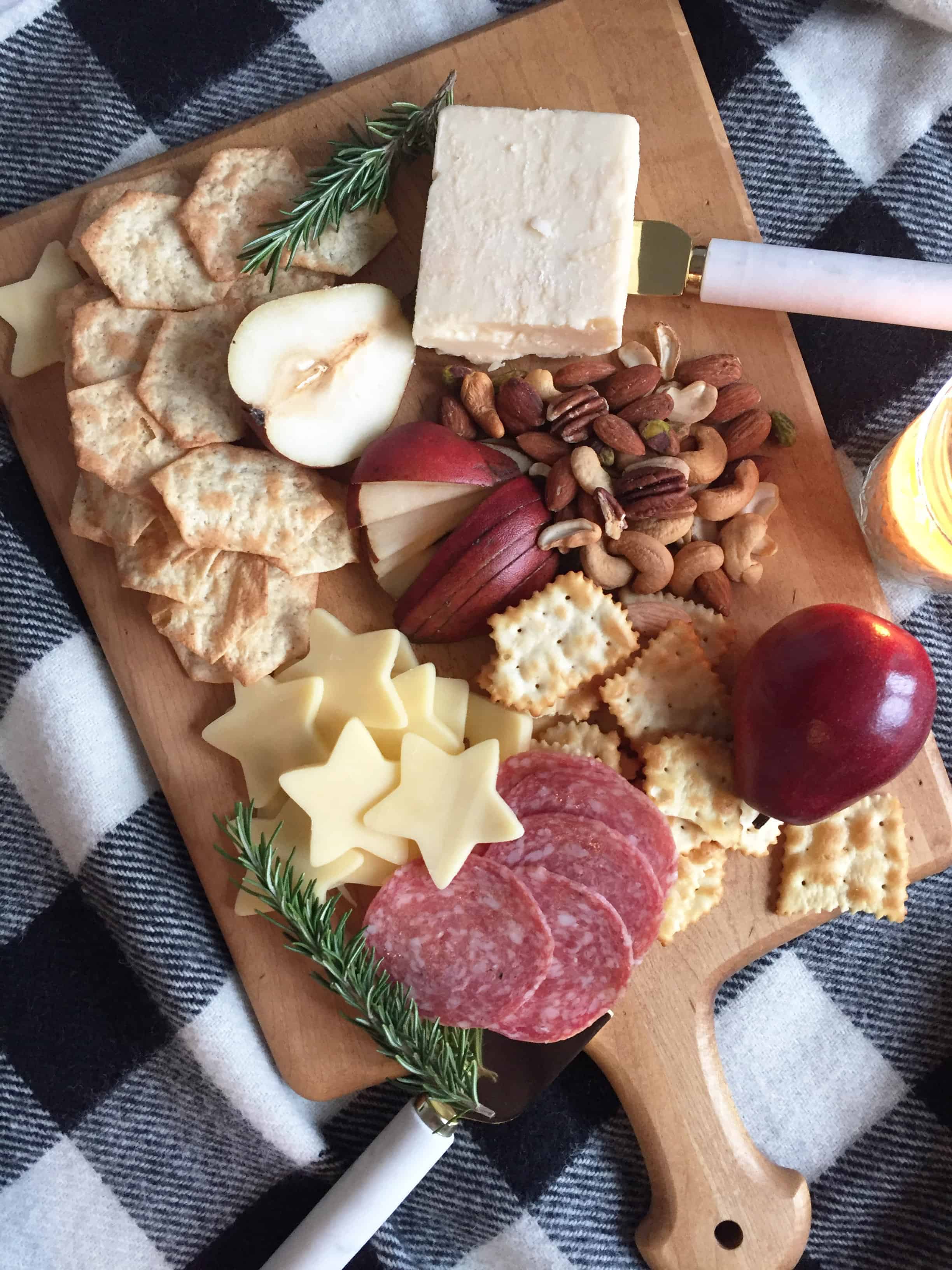 Steps to making a cozy winter charcuterie board. 