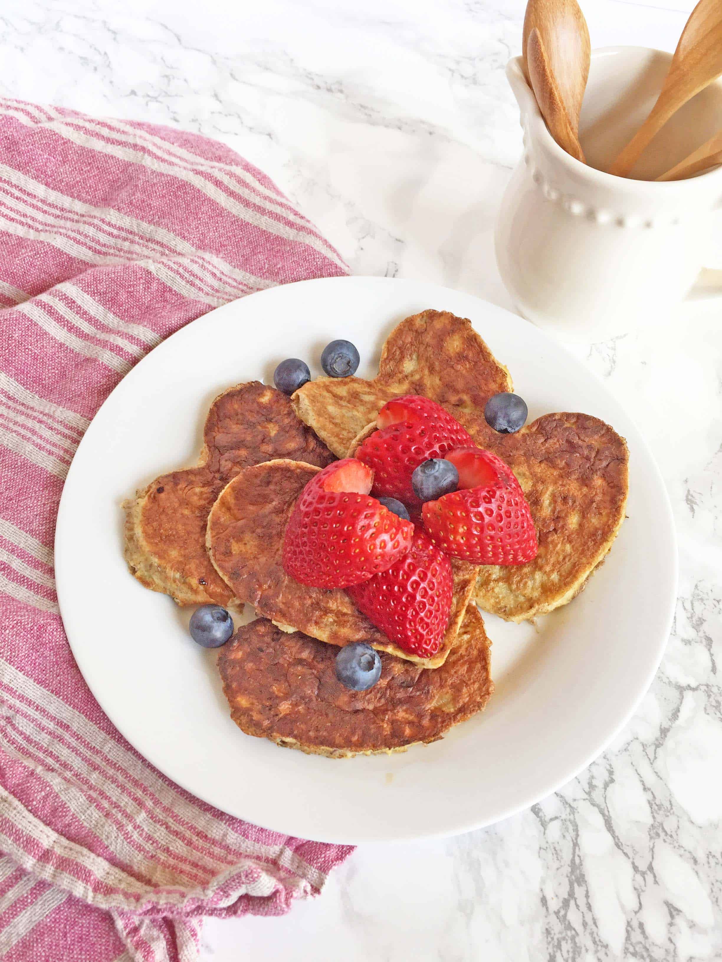 paleo pancakes, heart shaped pancakes with heart shaped strawberries