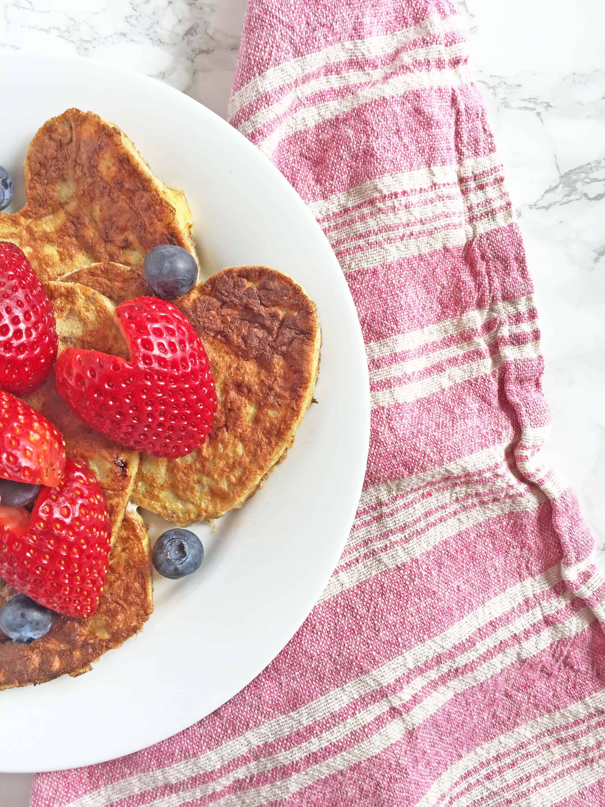 paleo pancakes, heart shaped pancakes with heart shaped strawberries