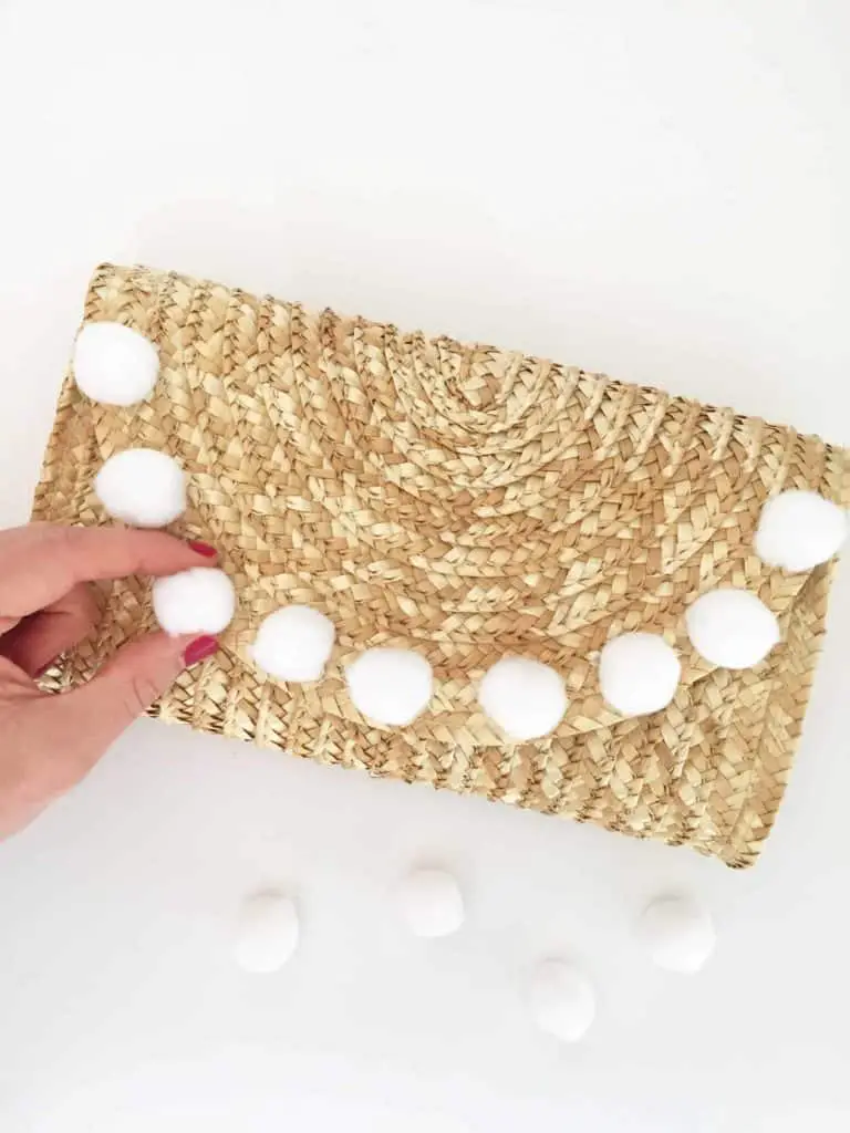 DIY straw pom pom clutch. 