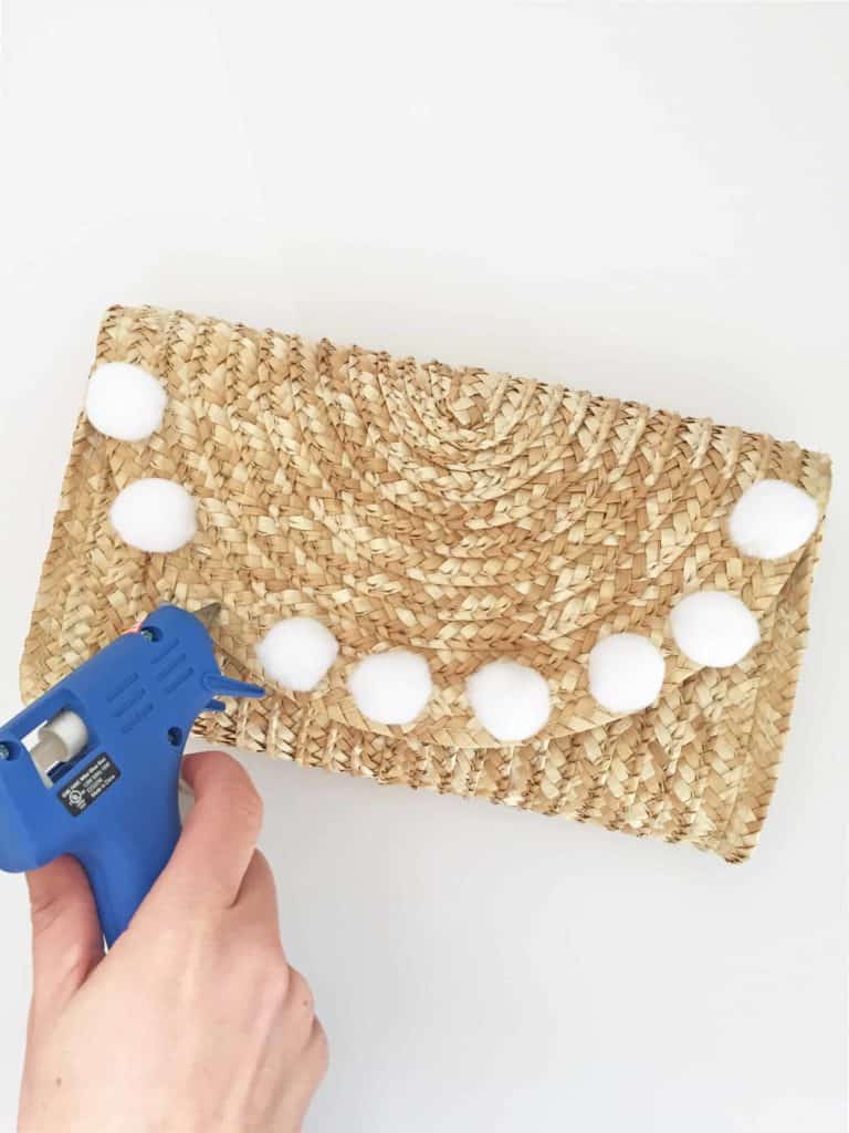 DIY straw pom pom clutch. 