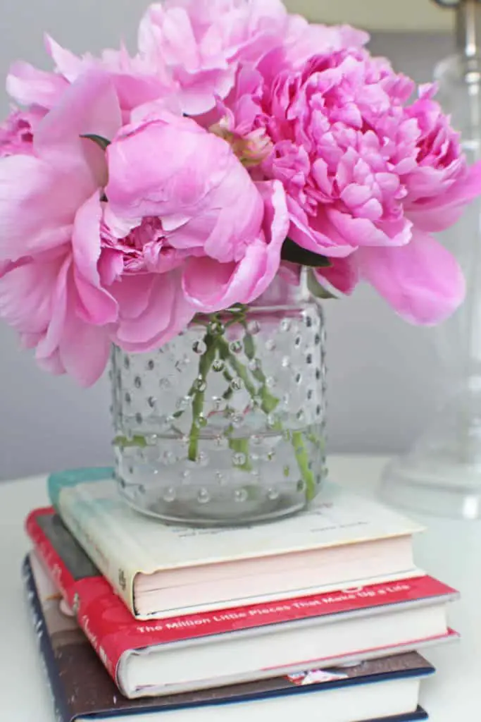 pink peonies in hobnail glass vase