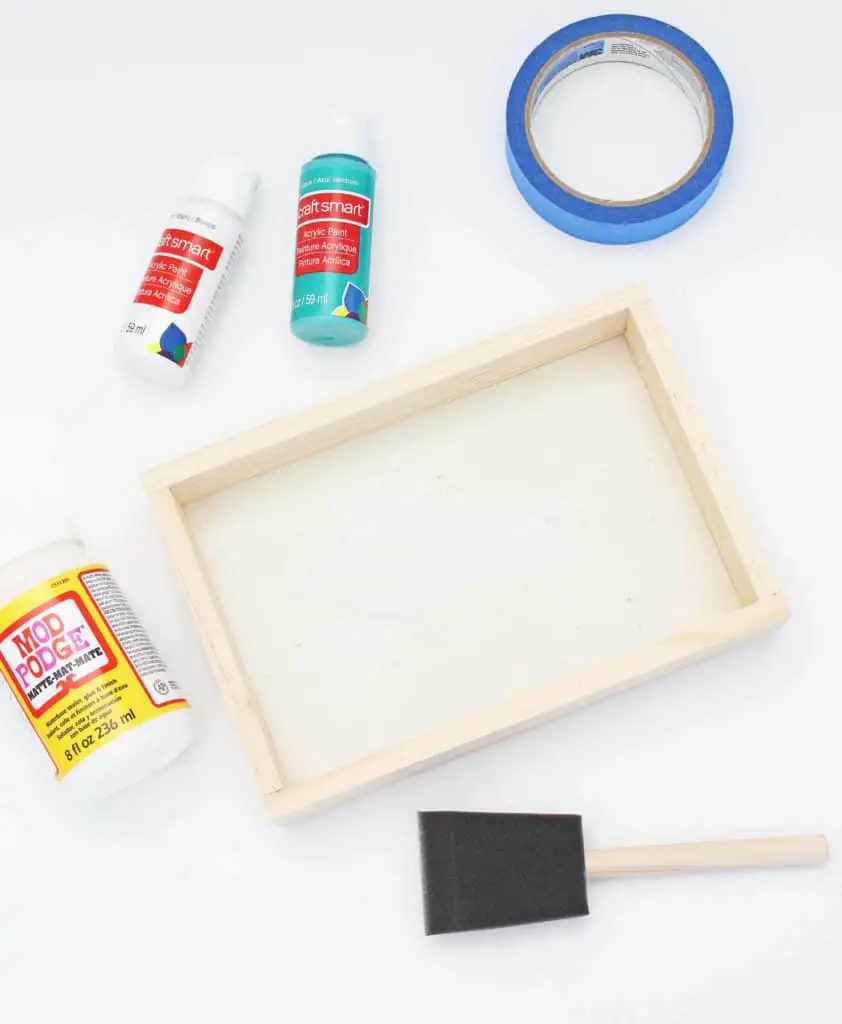 This DIY color block jewelry tray is an easy way to corral small items while adding a pop of color to your home.  #jewelrytray #diyjewelrytray #jewelrybox #catchall #colorful #turquoise #aqua #easydiyprojects #acrylicpaint #jewelryorganization #jewelryhack
