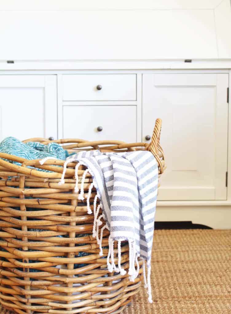 large wicker basket with blankets