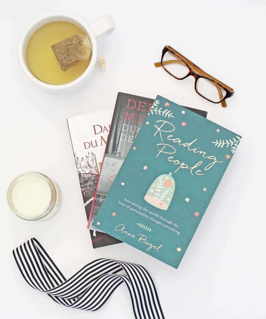 book and eye glasses flatlay