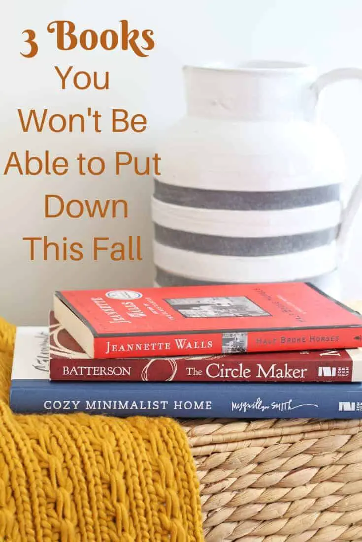 stack of books with pitcher