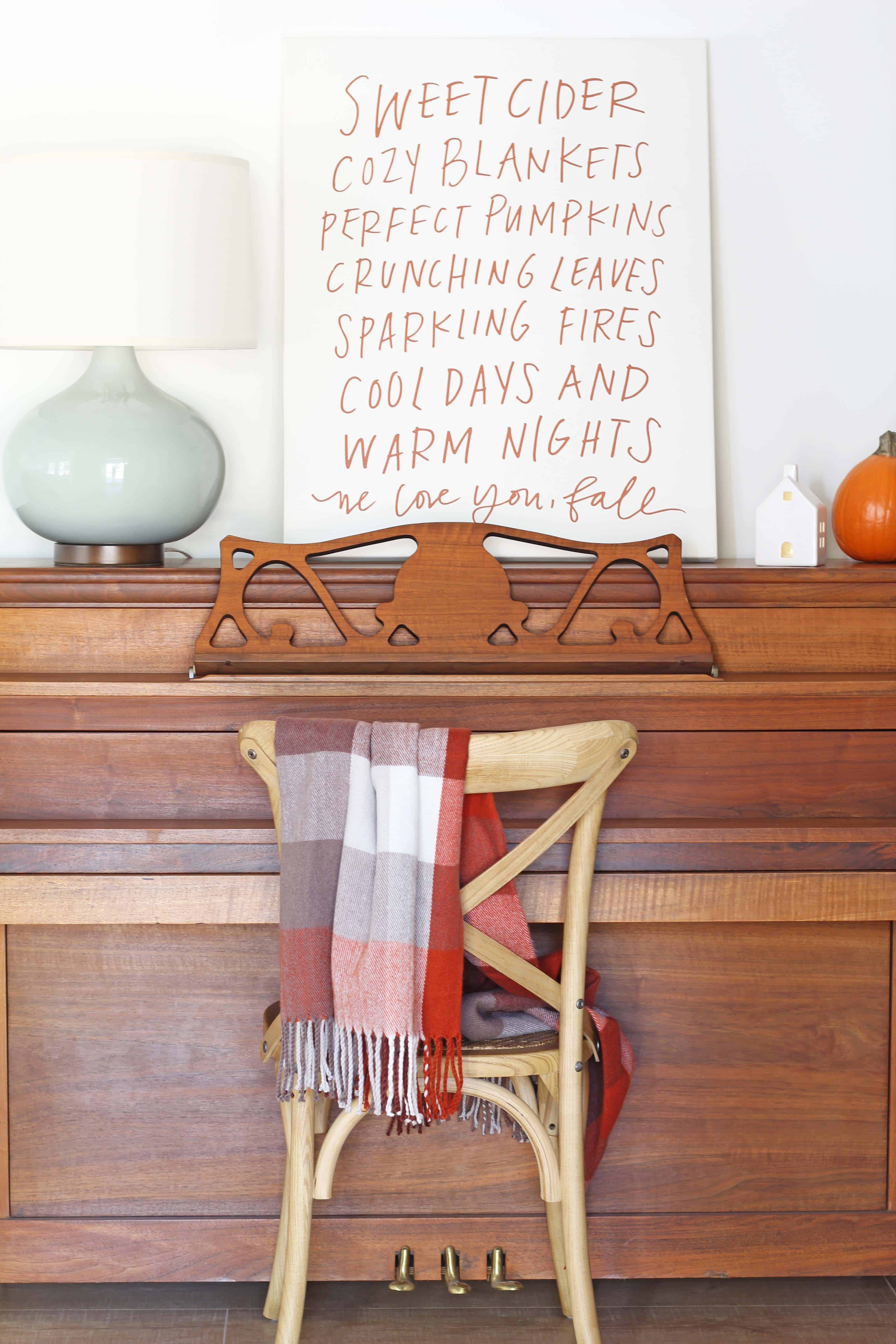 Fall entryway with lindsay letters word art and ceramic village house