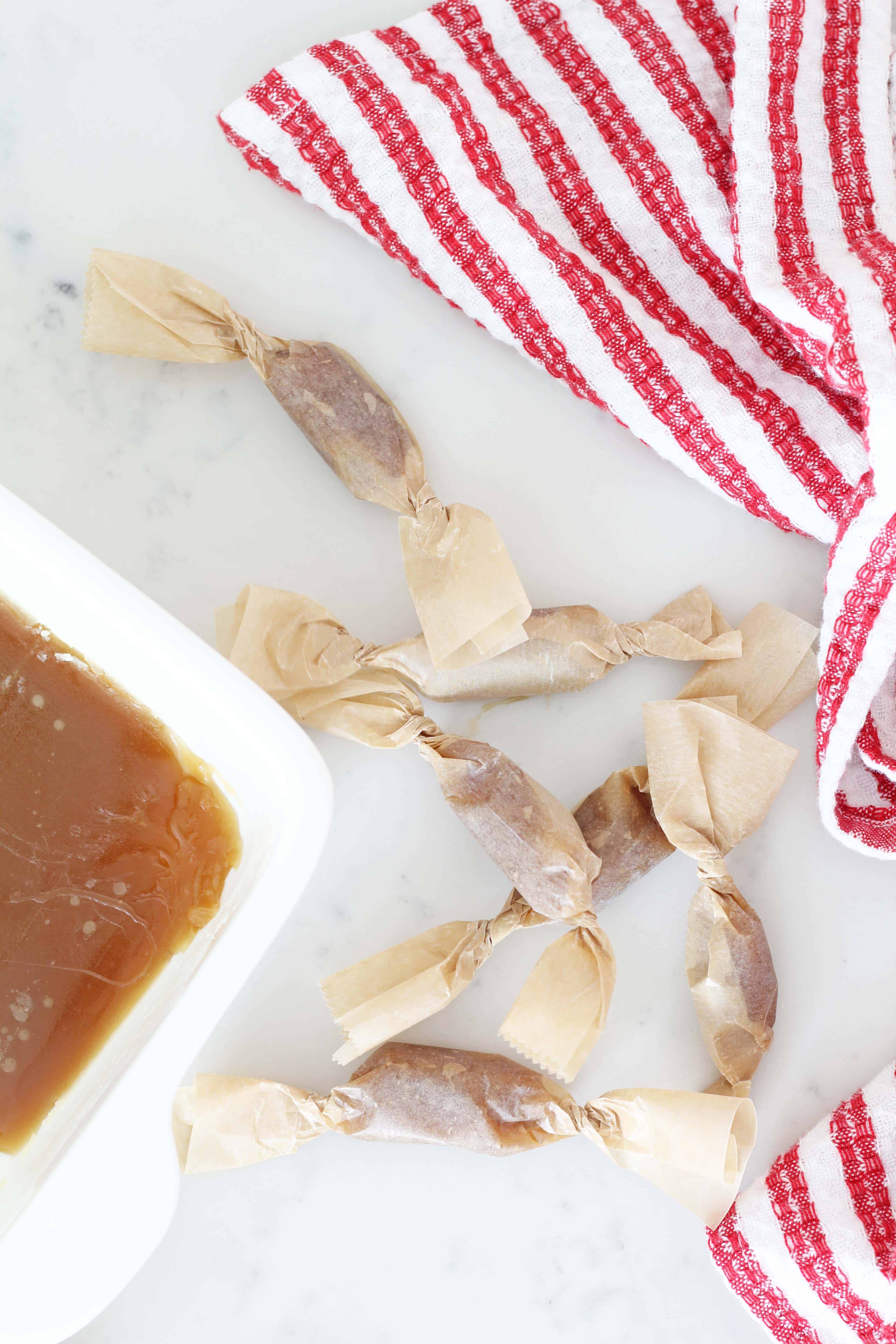 homemade caramels in brown parchment paper