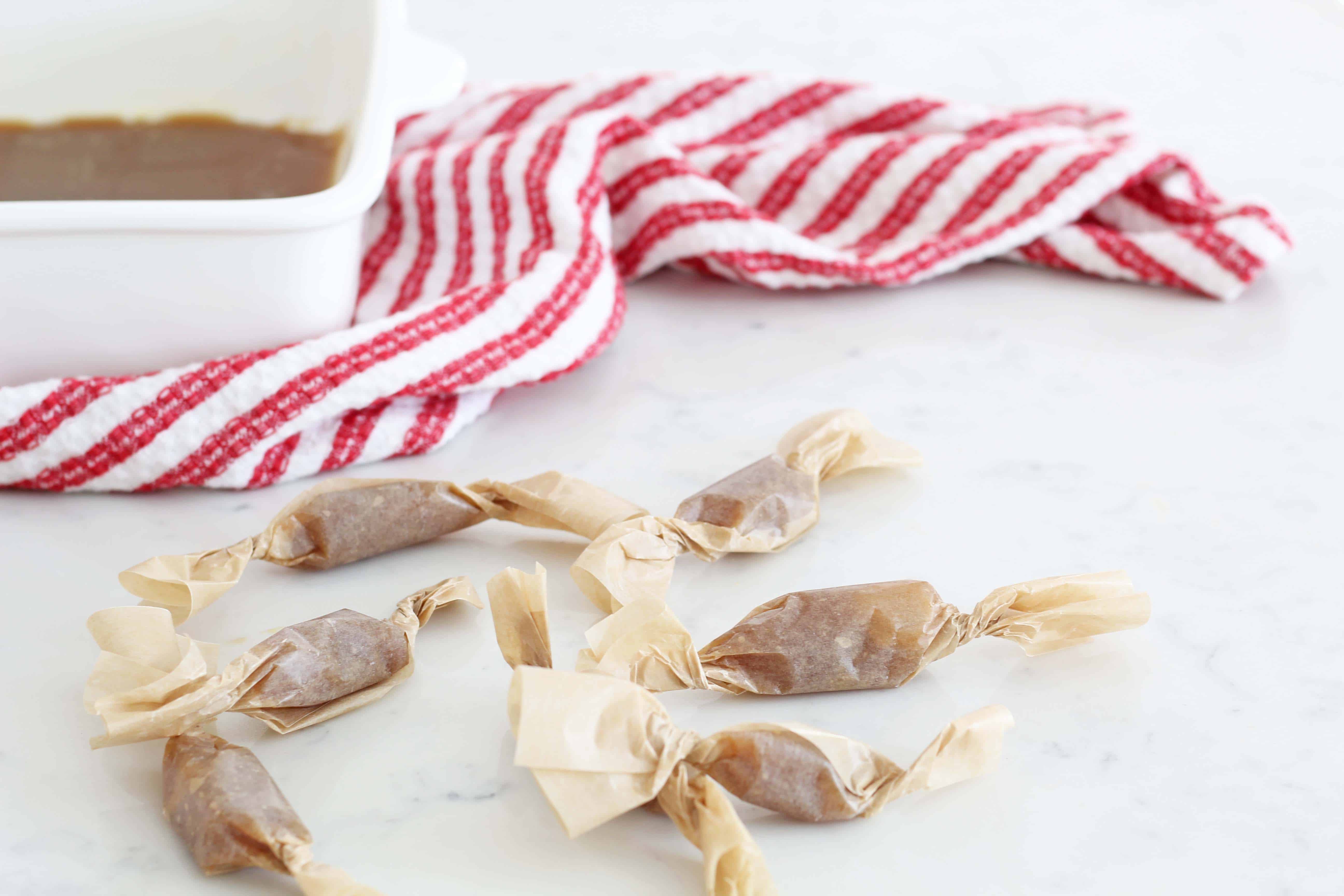 homemade caramels in brown parchment paper