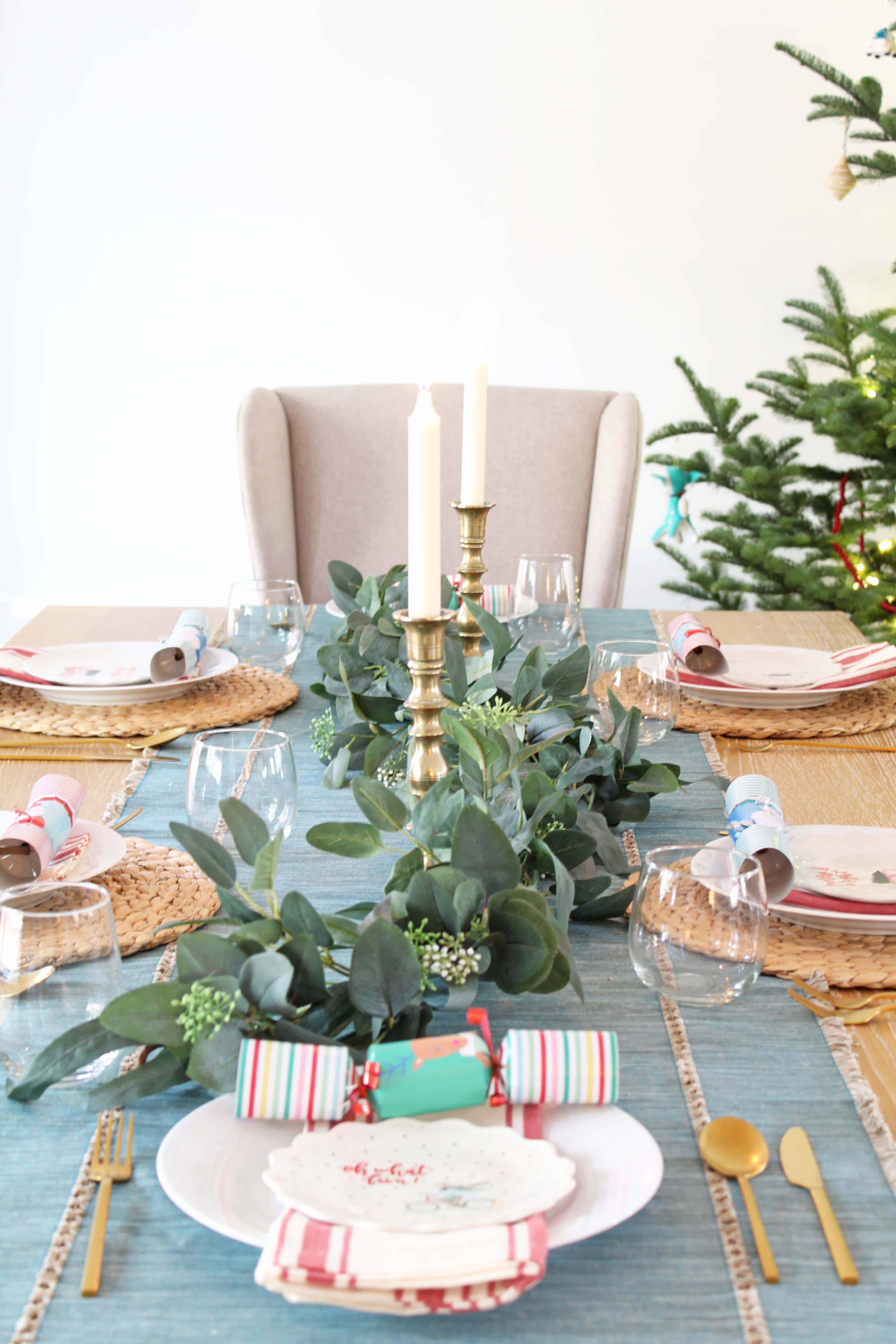 pier one dining table with eucalyptus garland 