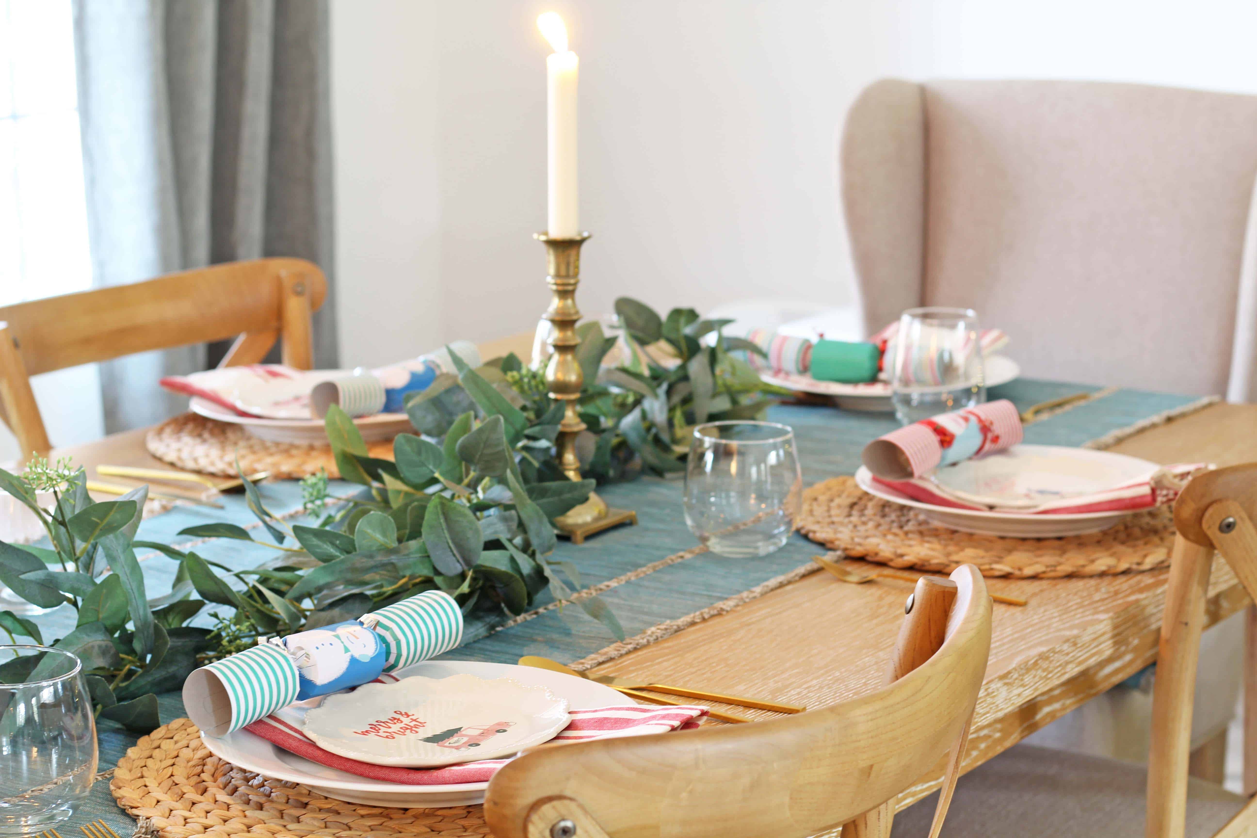 colorful christmas table with christmas crackers 