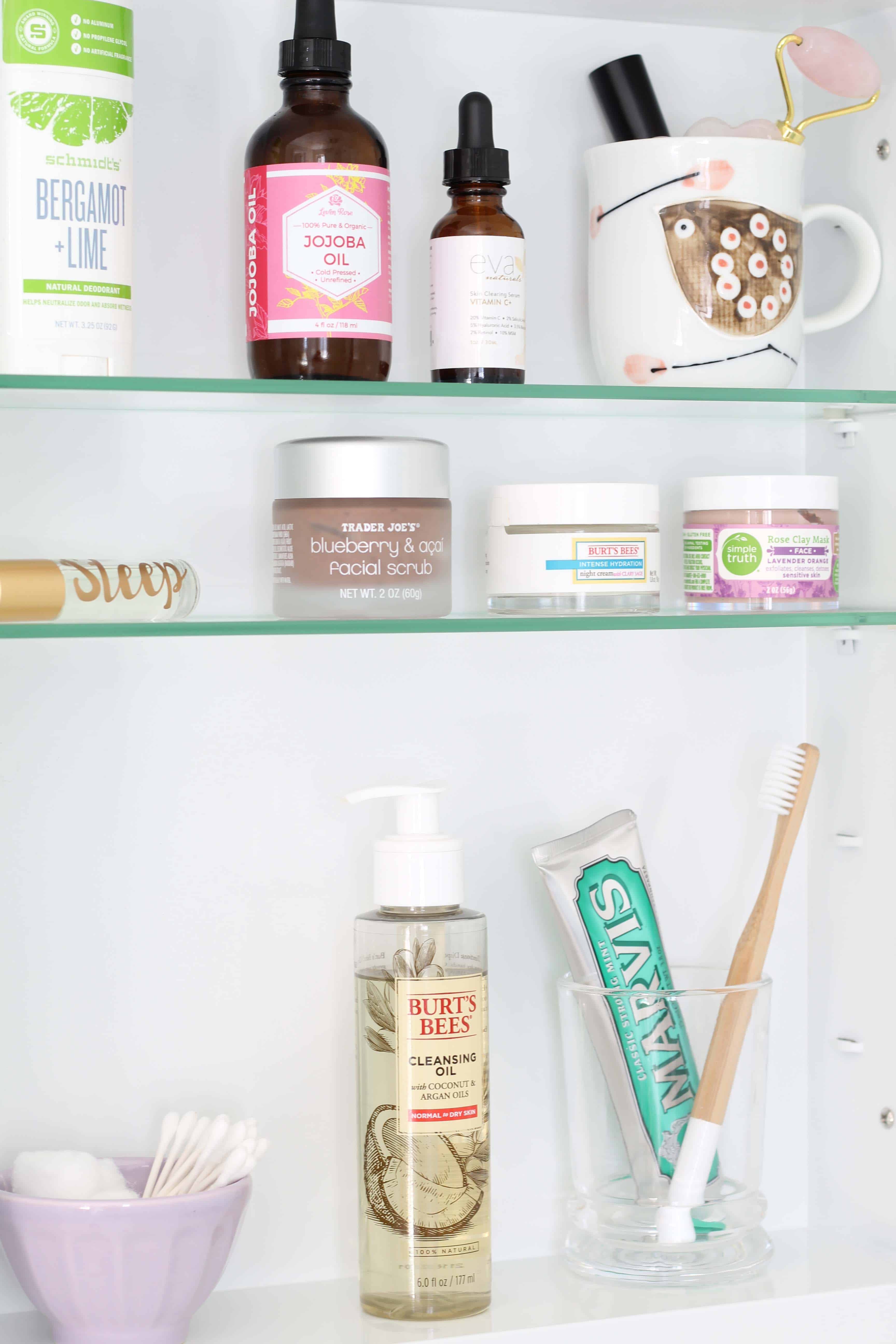 recessed medicine cabinet with margins toothpaste, wood toothbrush, anthropologie mini latte bowl