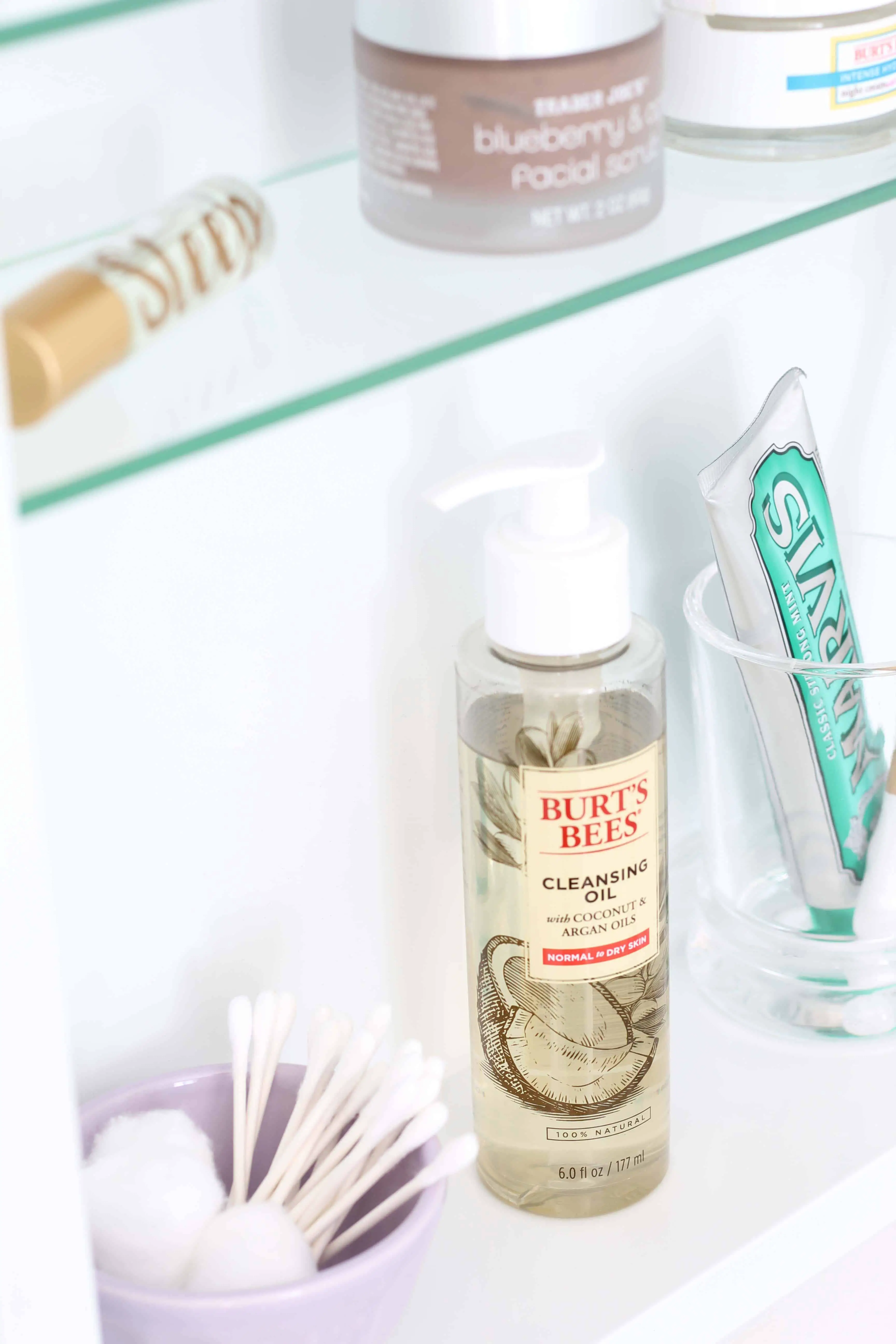 recessed medicine cabinet with margins toothpaste, wood toothbrush, anthropologie mini latte bowl