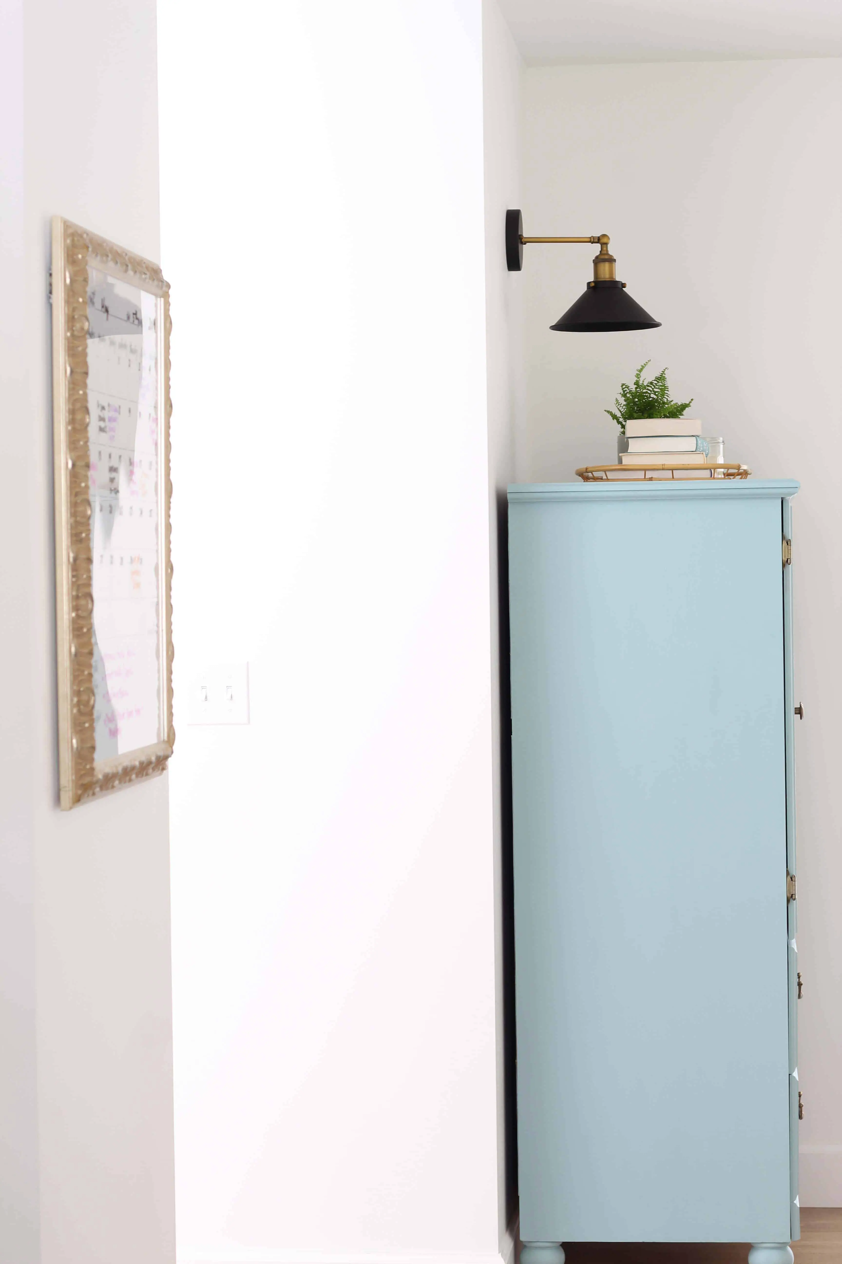 small armoire painted in kilz juniper blue chalk paint, modern farmhouse black wall sconce, bamboo serving tray