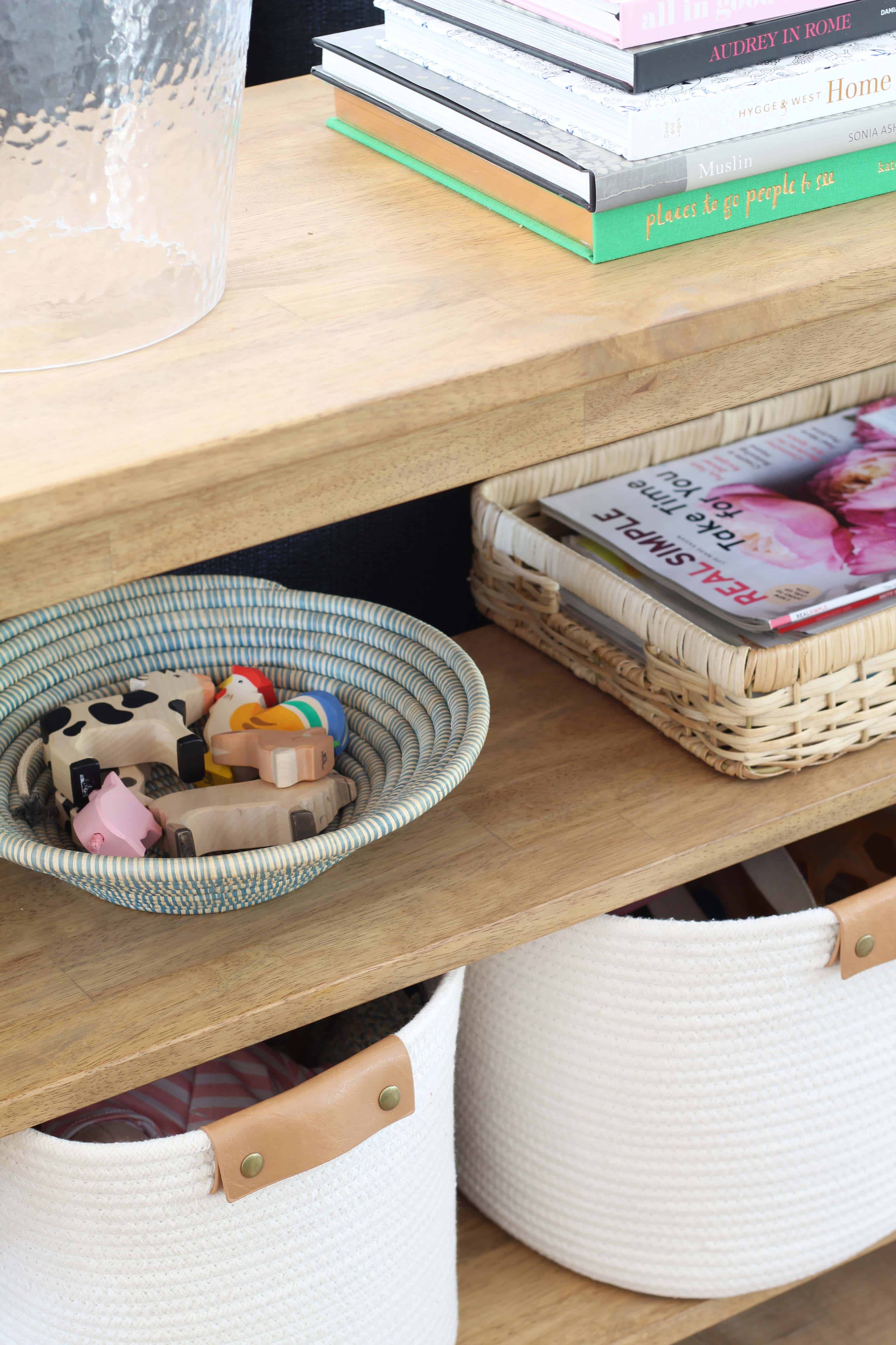 farmhouse console table, wooden toy animals, target rope baskets with leather handles