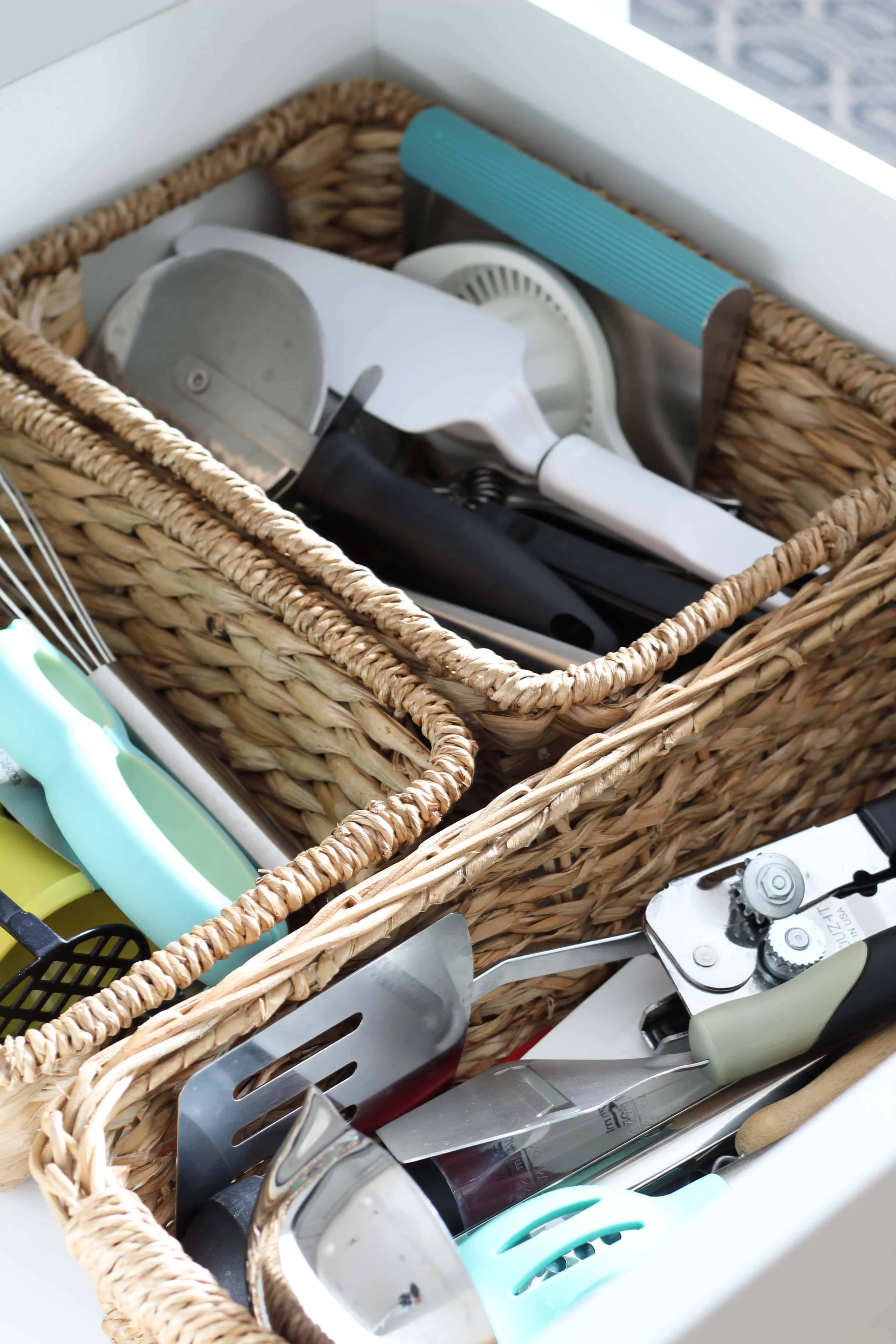 baskets in kitchen drawer to organized kitchen utensils