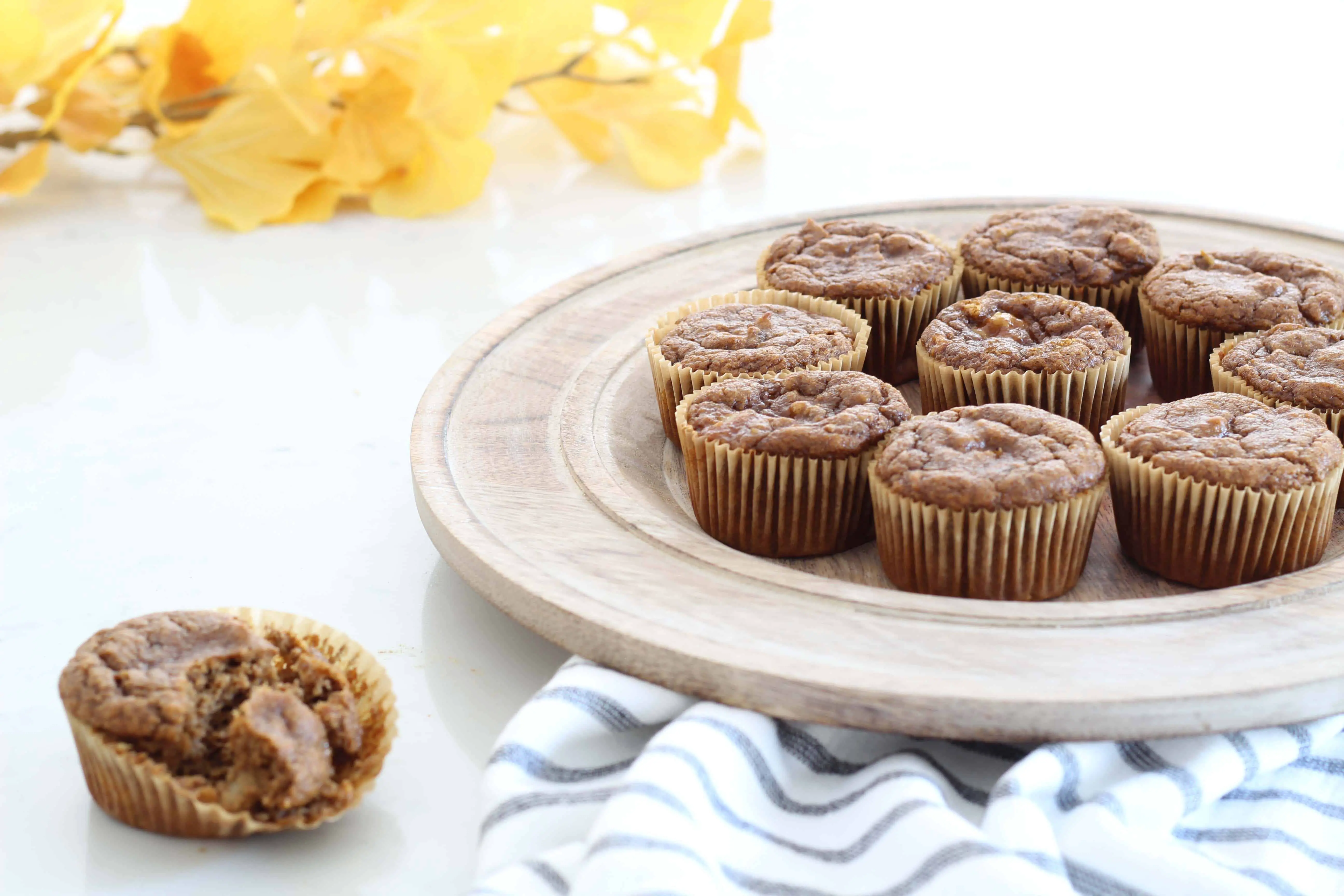 gluten free, paleo pumpkin spice muffins with yellow gingko leaves