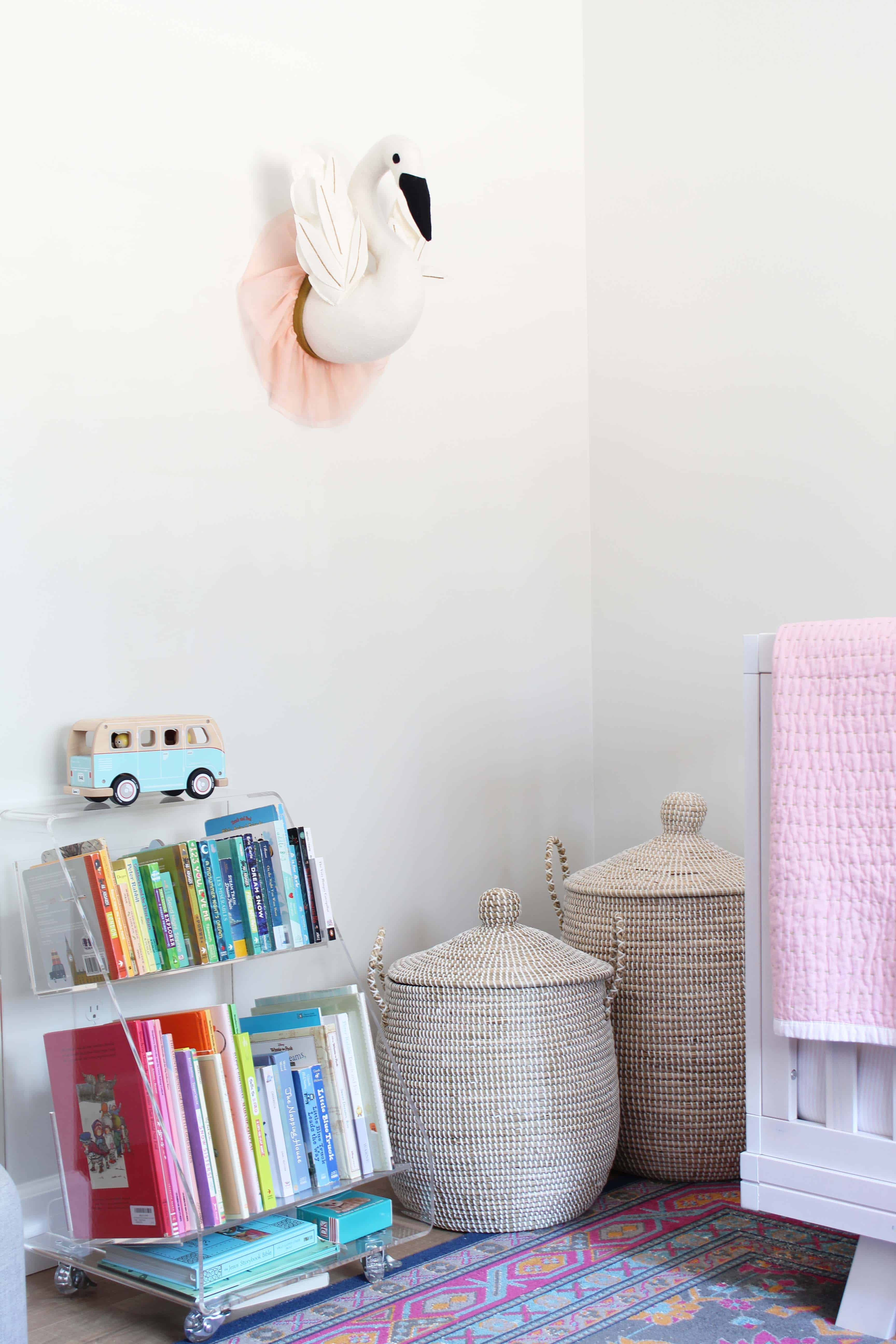 taget stuffed swan wall bust, crate and barrel kids acrylic book cart, serena and lily lidded baskets