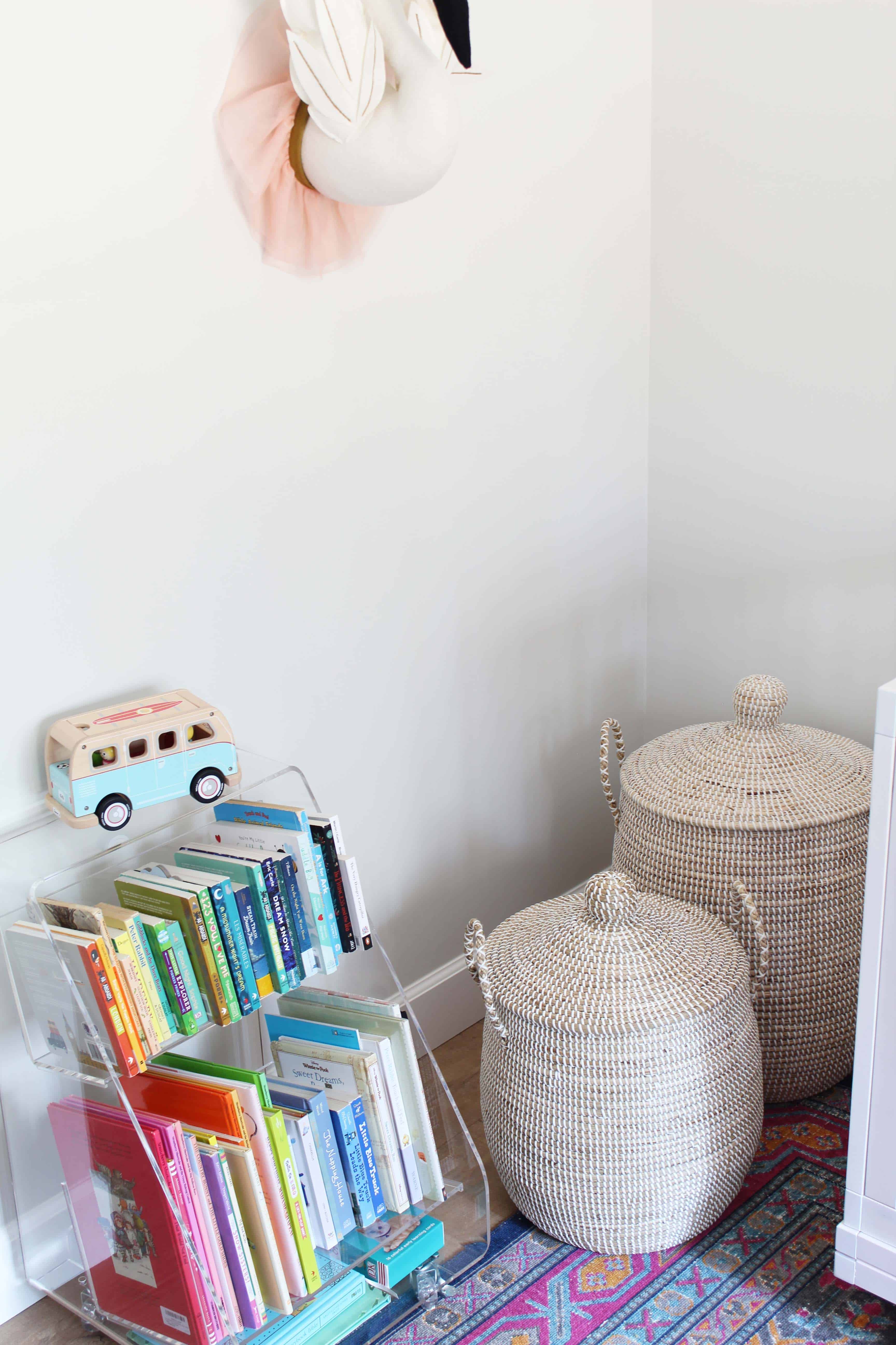 target swan wall head, serena and lily lidded baskets, crate and kids acrylic book cart