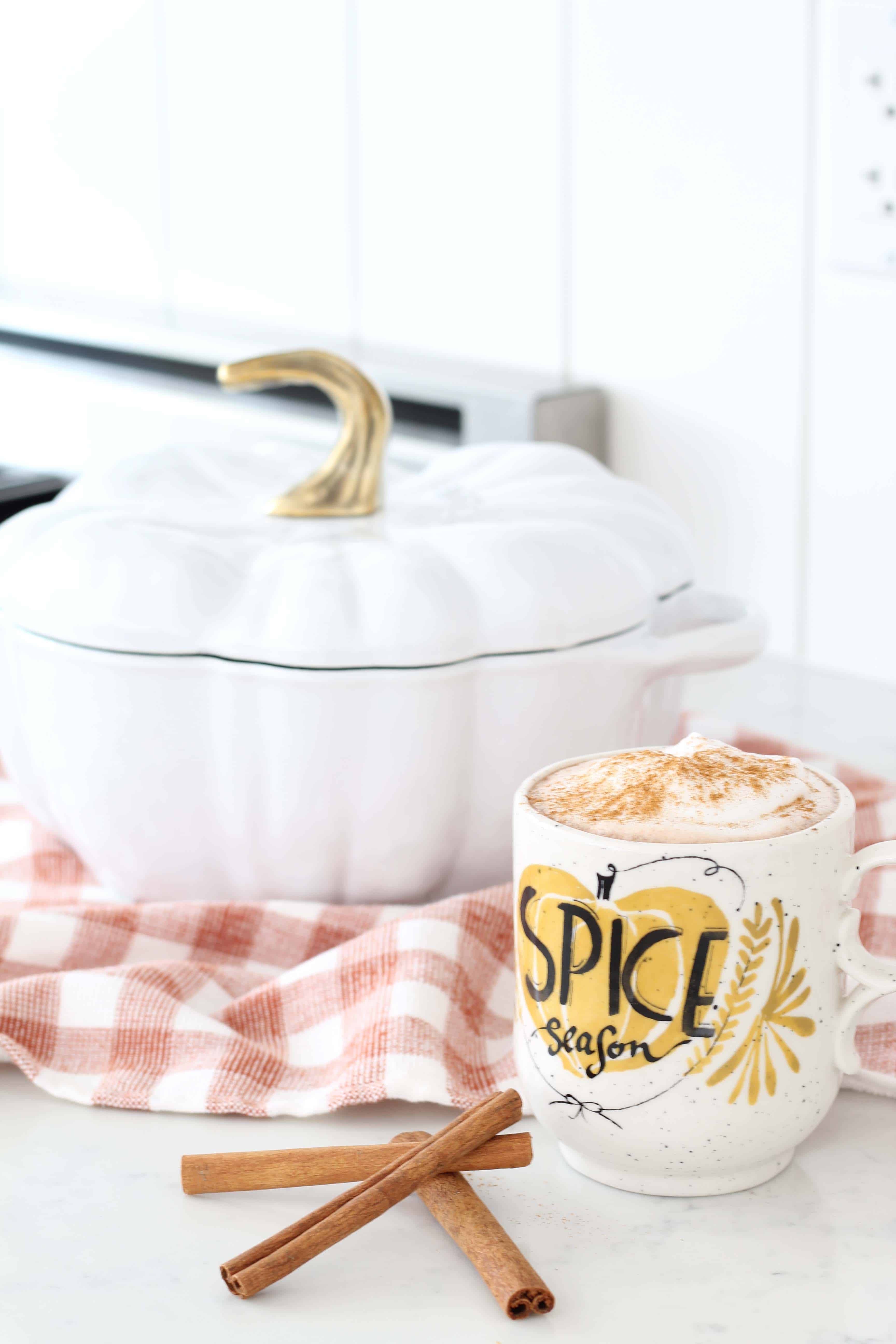 staub white pumpkin cocotte, orange gingham dishtowel, anthropologie pumpkin spice season mug