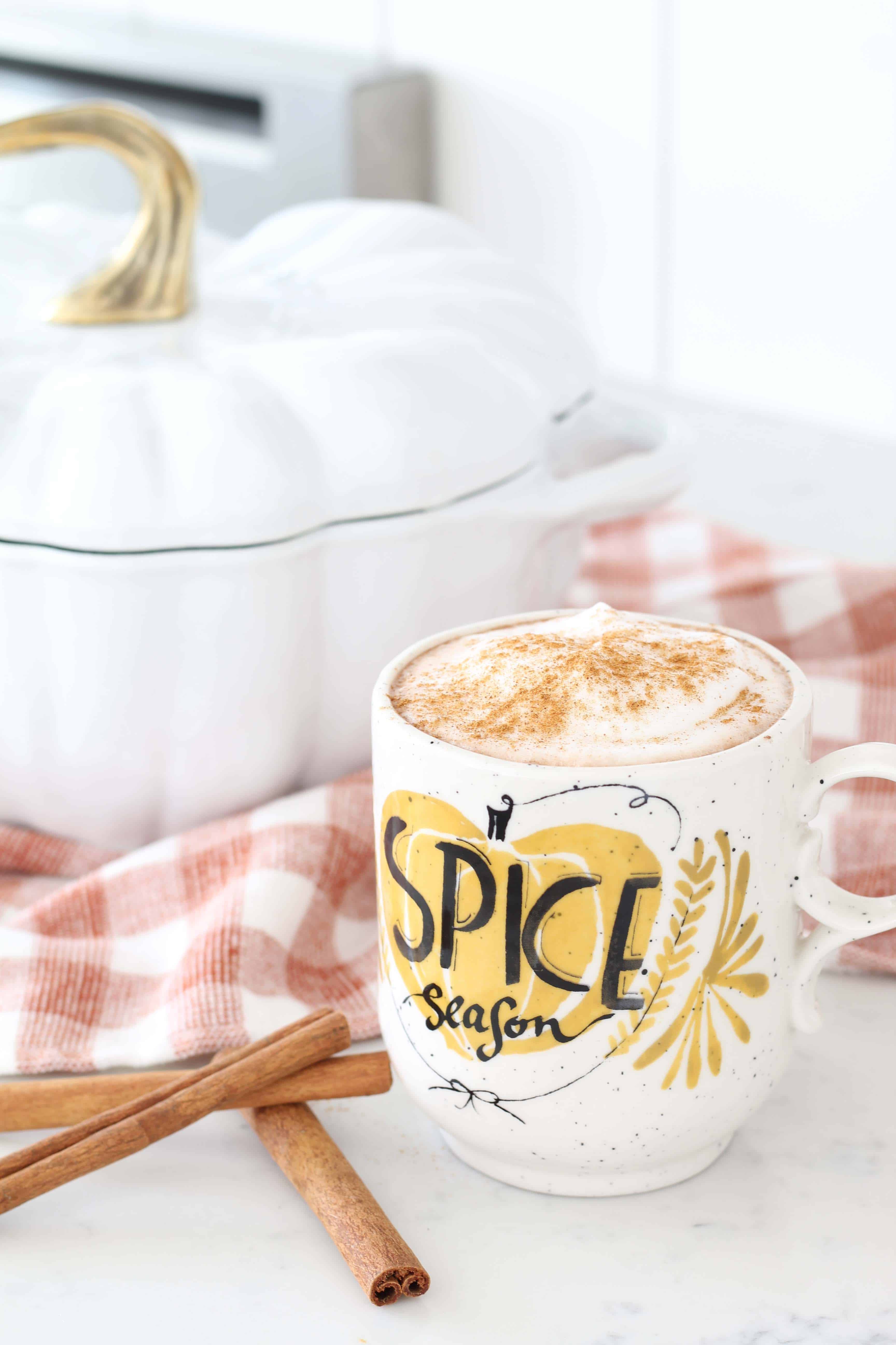 staub white pumpkin cocotte, orange gingham dishtowel, anthropologie pumpkin spice season mug