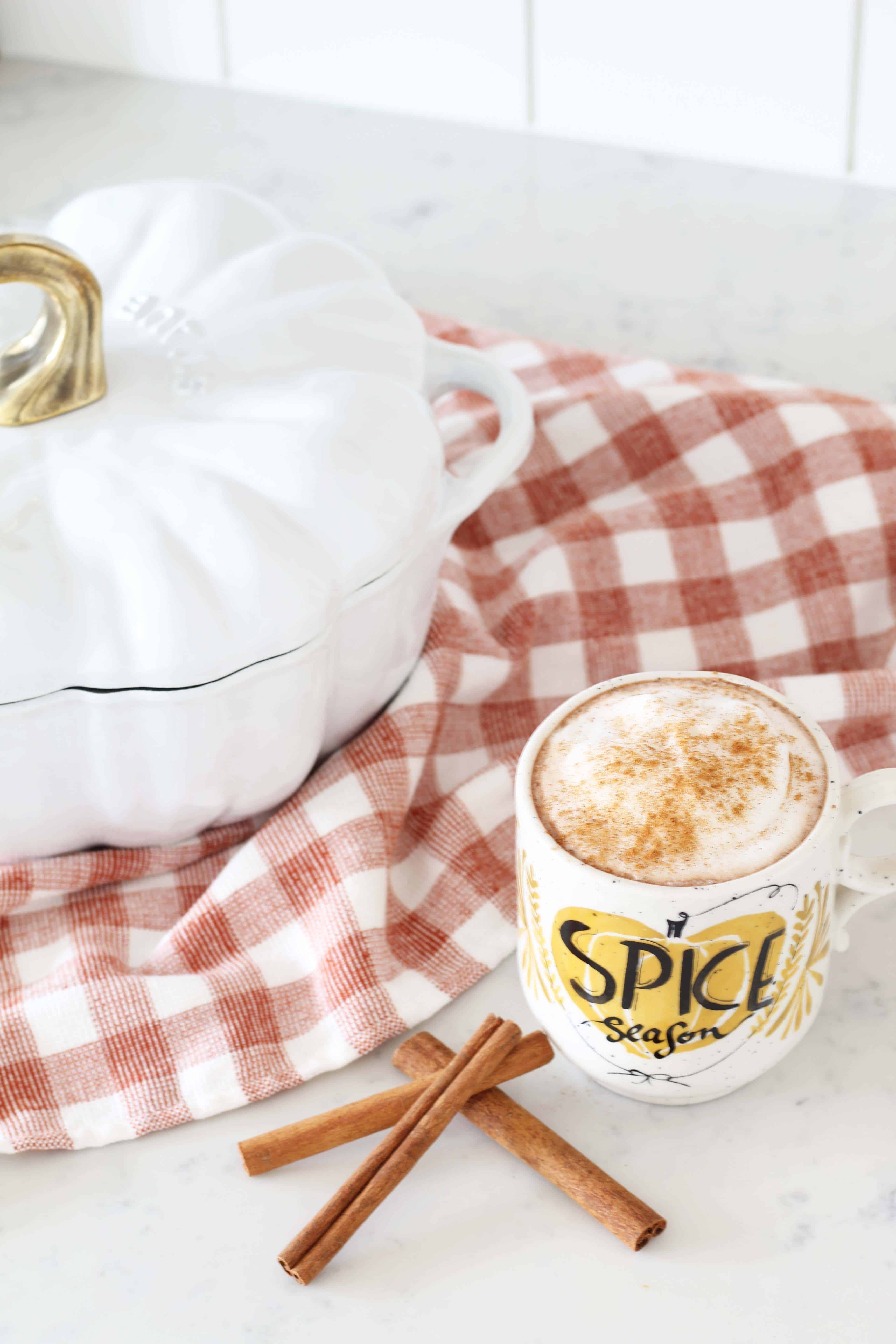 staub white pumpkin cocotte, orange gingham dishtowel, anthropologie pumpkin spice season mug