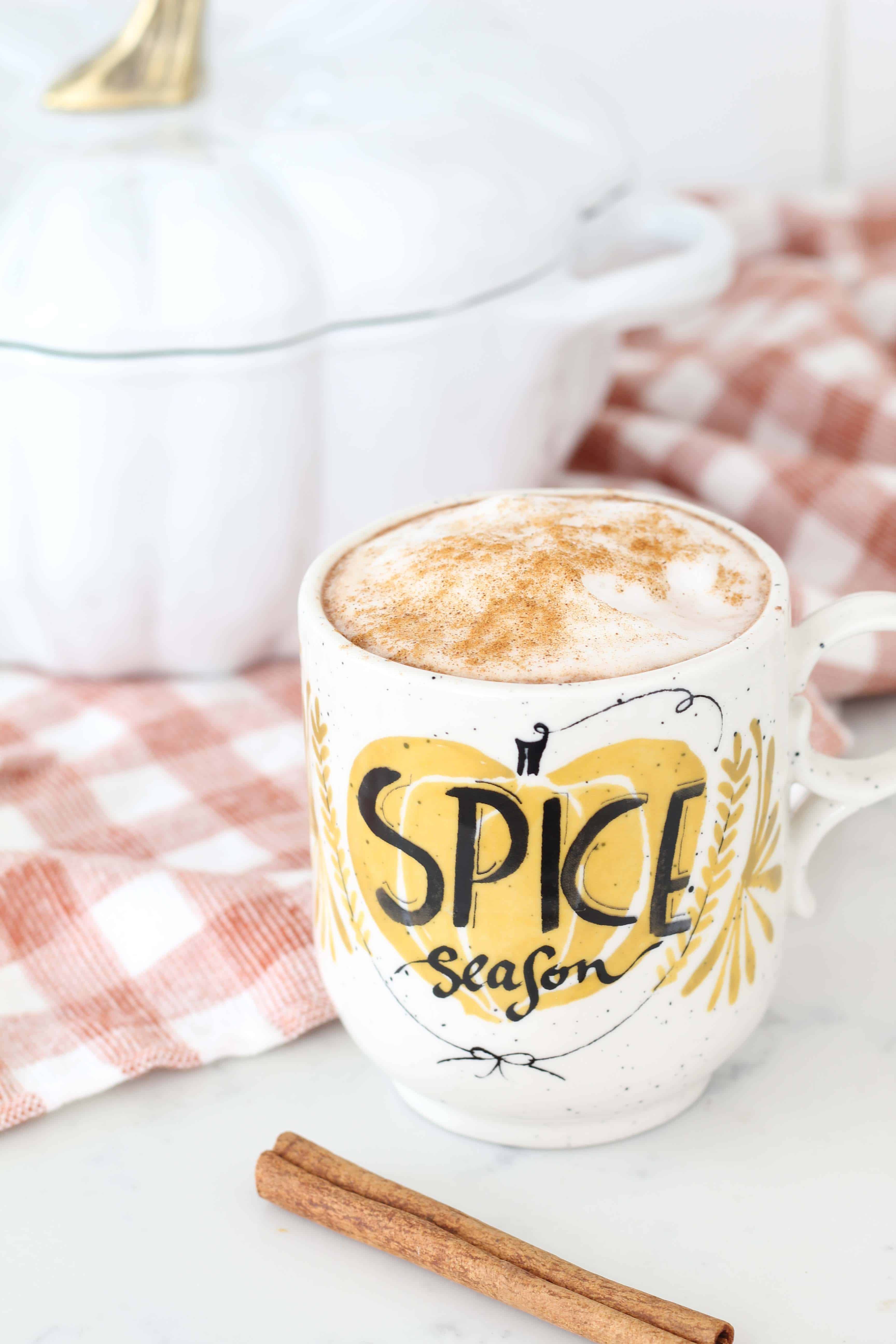 staub white pumpkin cocotte, orange gingham dishtowel, anthropologie pumpkin spice season mug