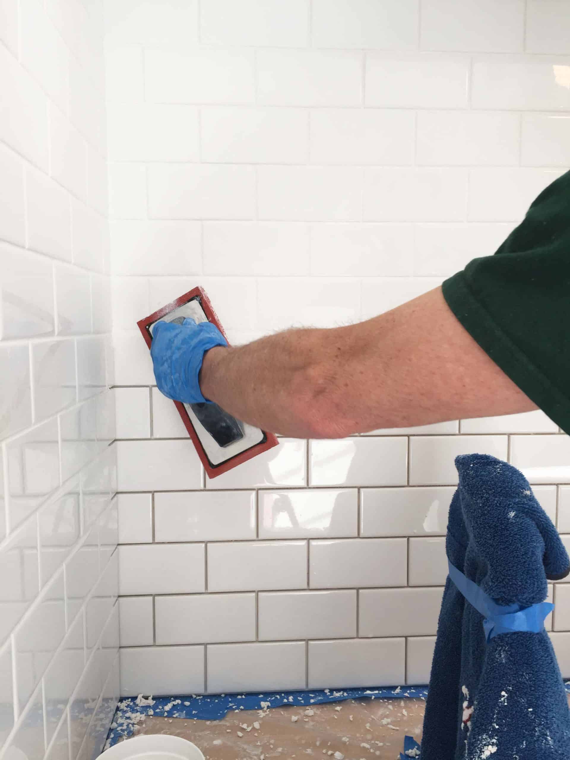 white subway tile backsplash in modern farmhouse laundry room 