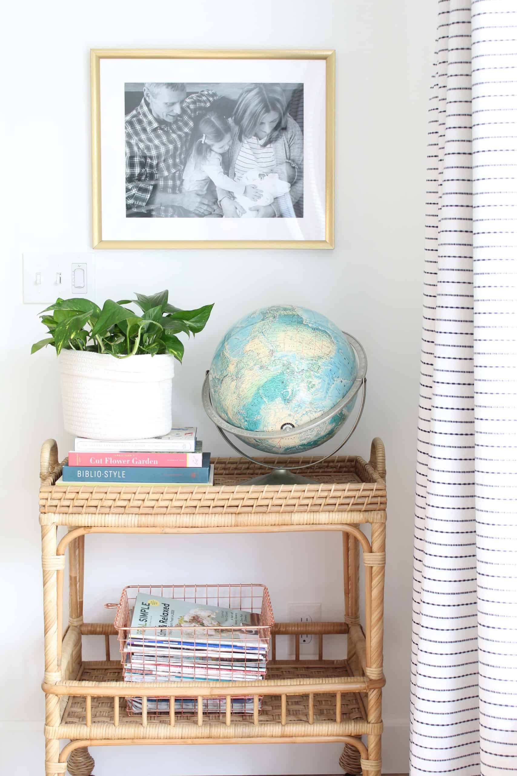 serena and lily rattan bar cart, vintage wool globe, pathos plant