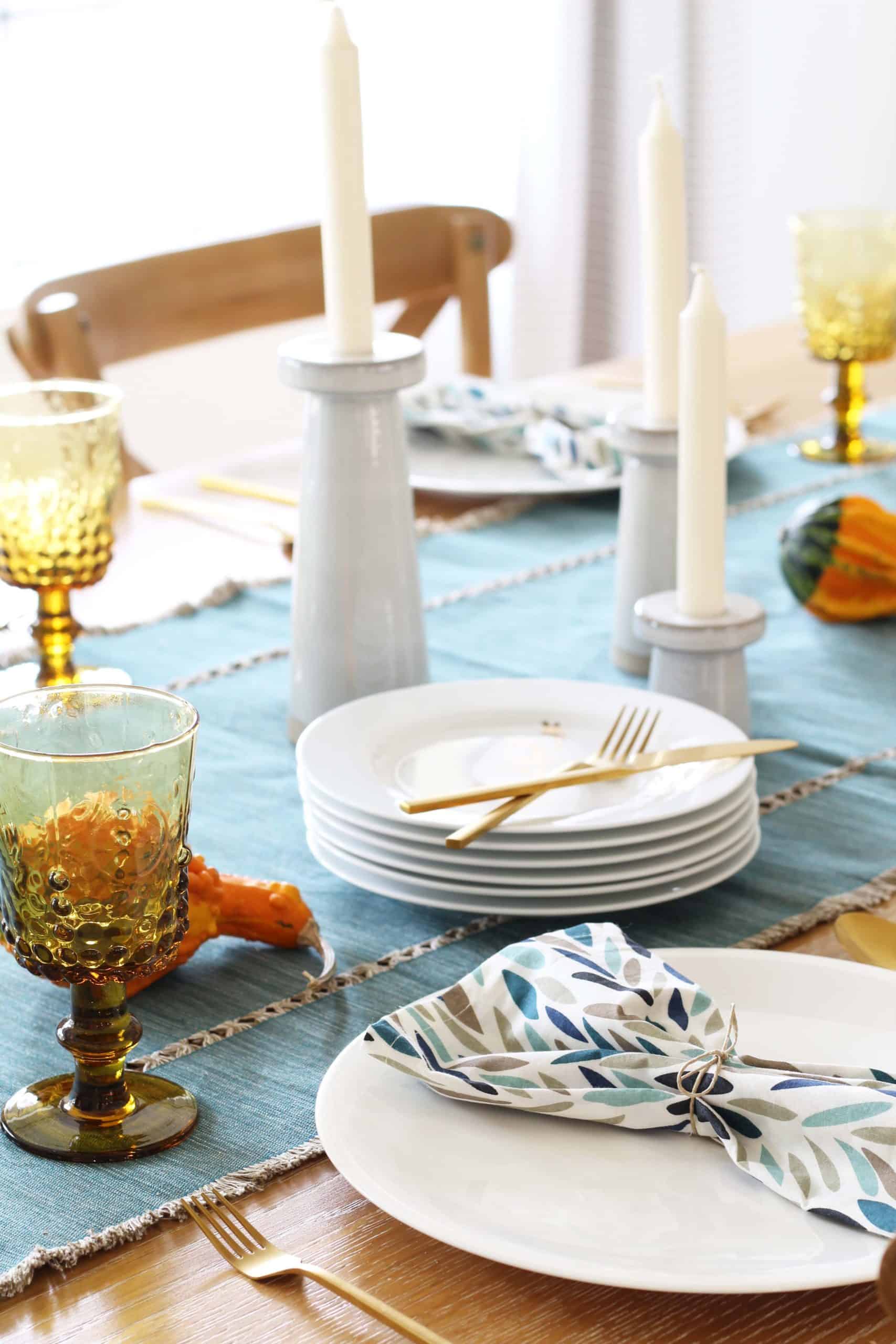 hearth and hand candlesticks, gourd, amber glass goblet, crate and barrel thankful plates