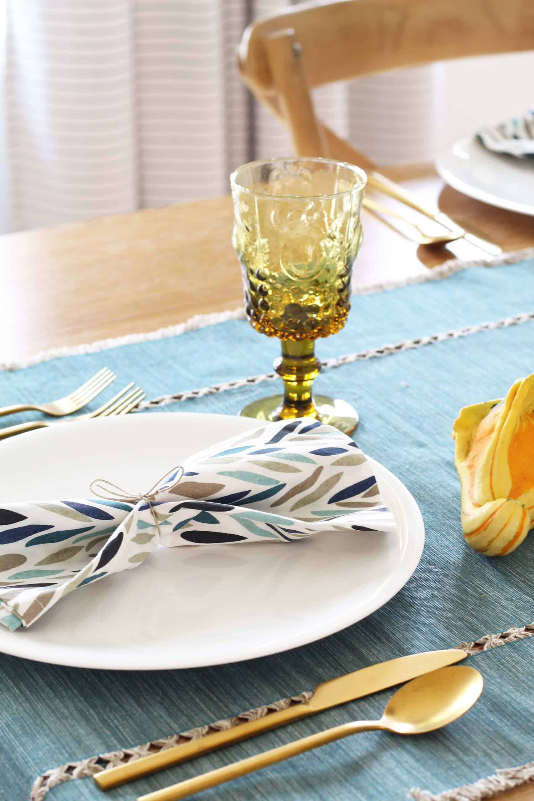 amber glass goblet, aqua table runner