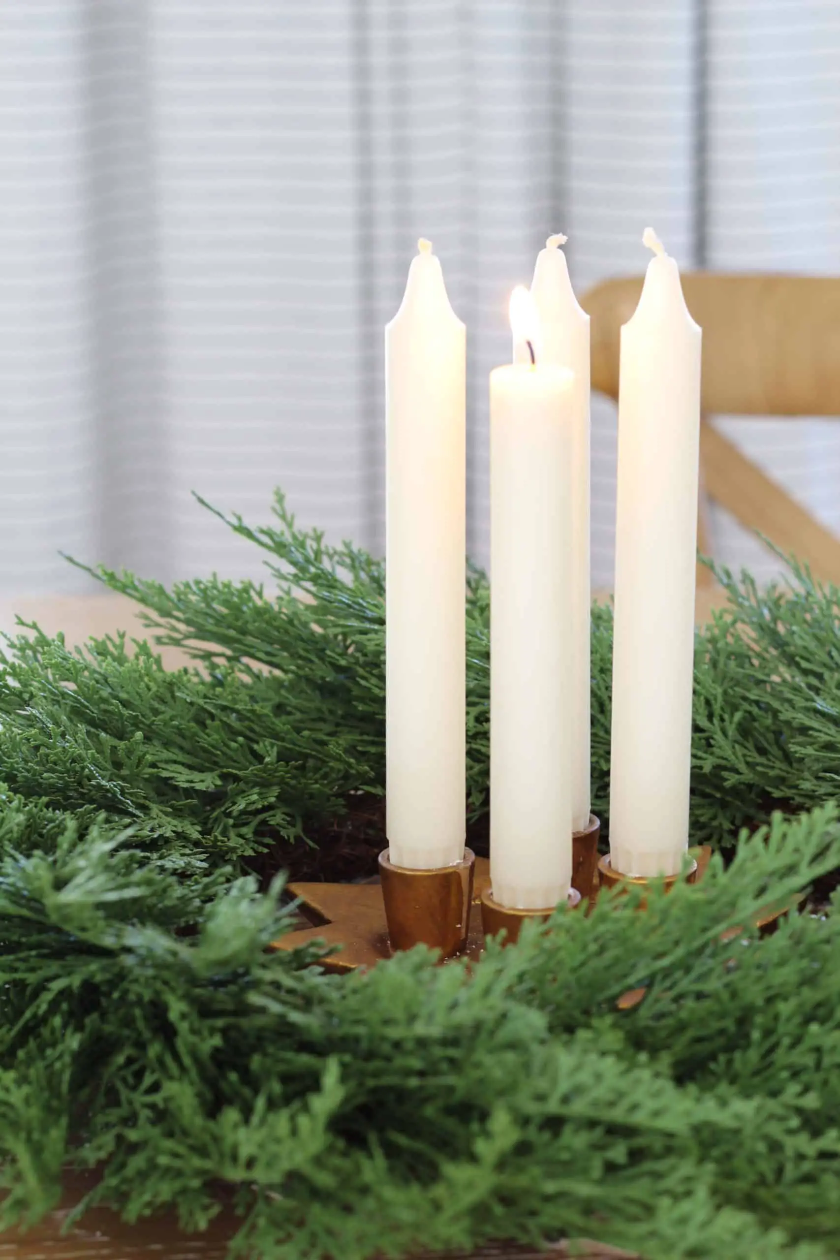 advent wreath with white candles and cedar wreath 
