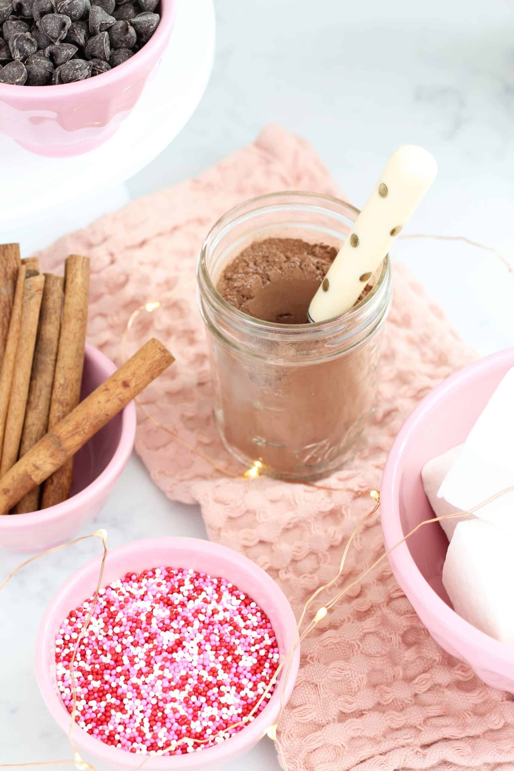 pink anthropologie bowls, valentine's hot chocolate bar, fairy lights