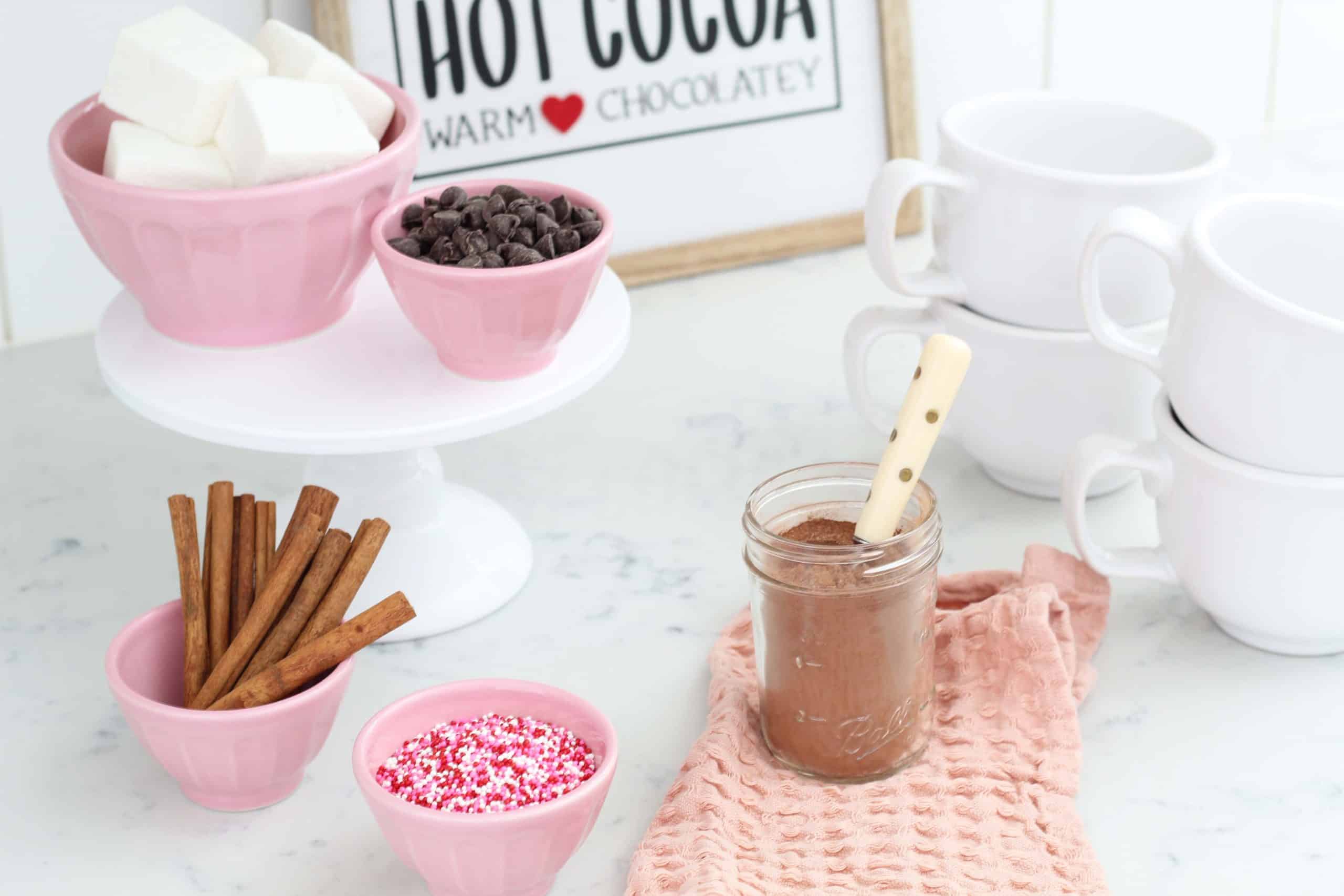 pink anthropologie bowls, white cake stand, homemade marshmallows, valentine's hot cocoa bar