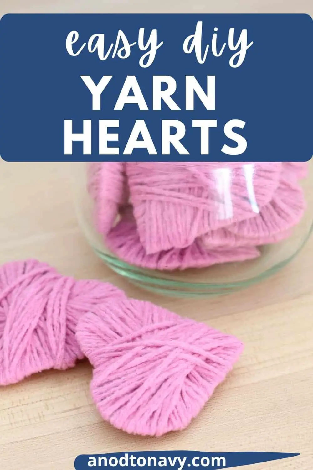 pink yarn hearts in glass jar