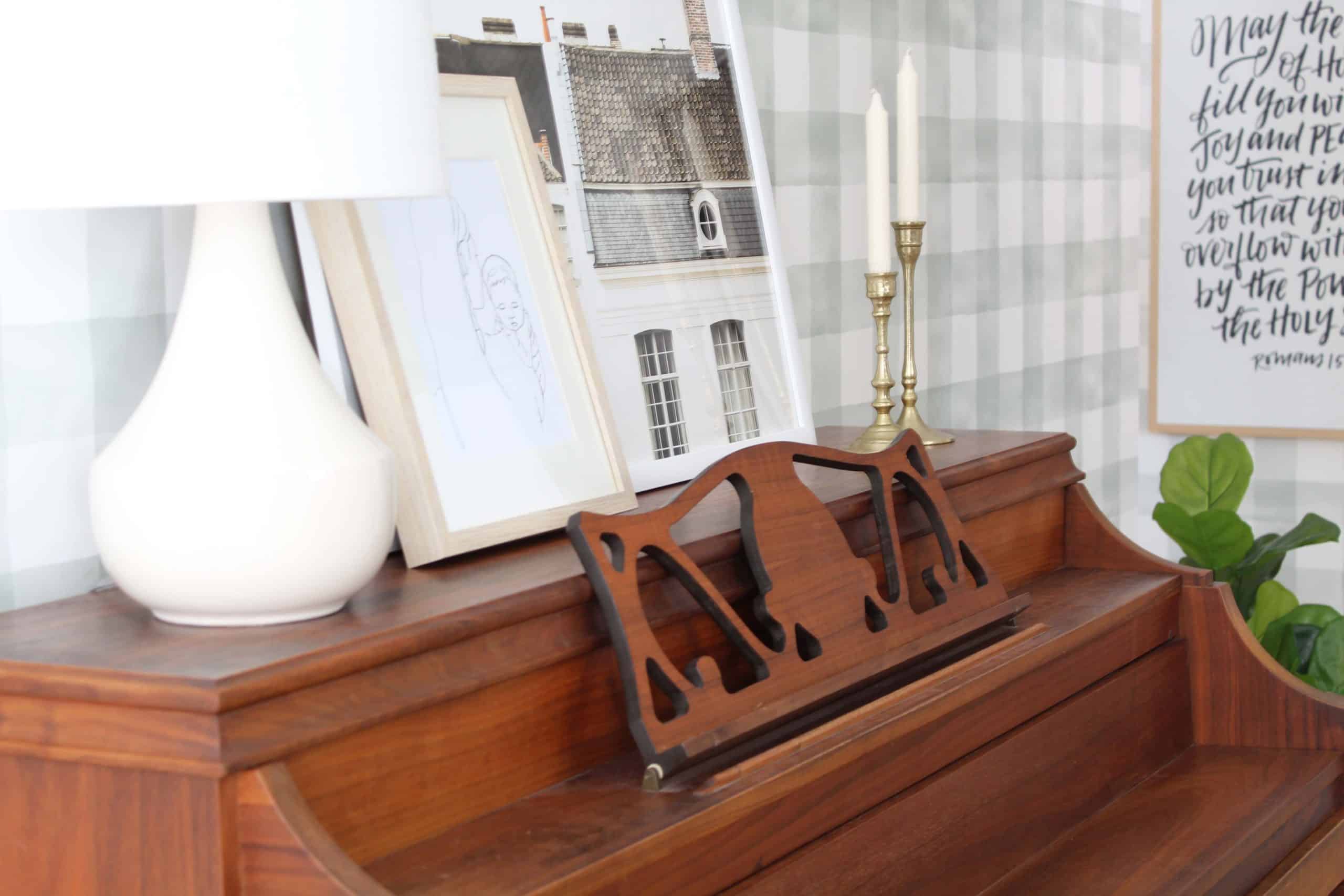 entryway with magnolia watercolor check wallpaper, vintage piano, and threshold wren lamp 