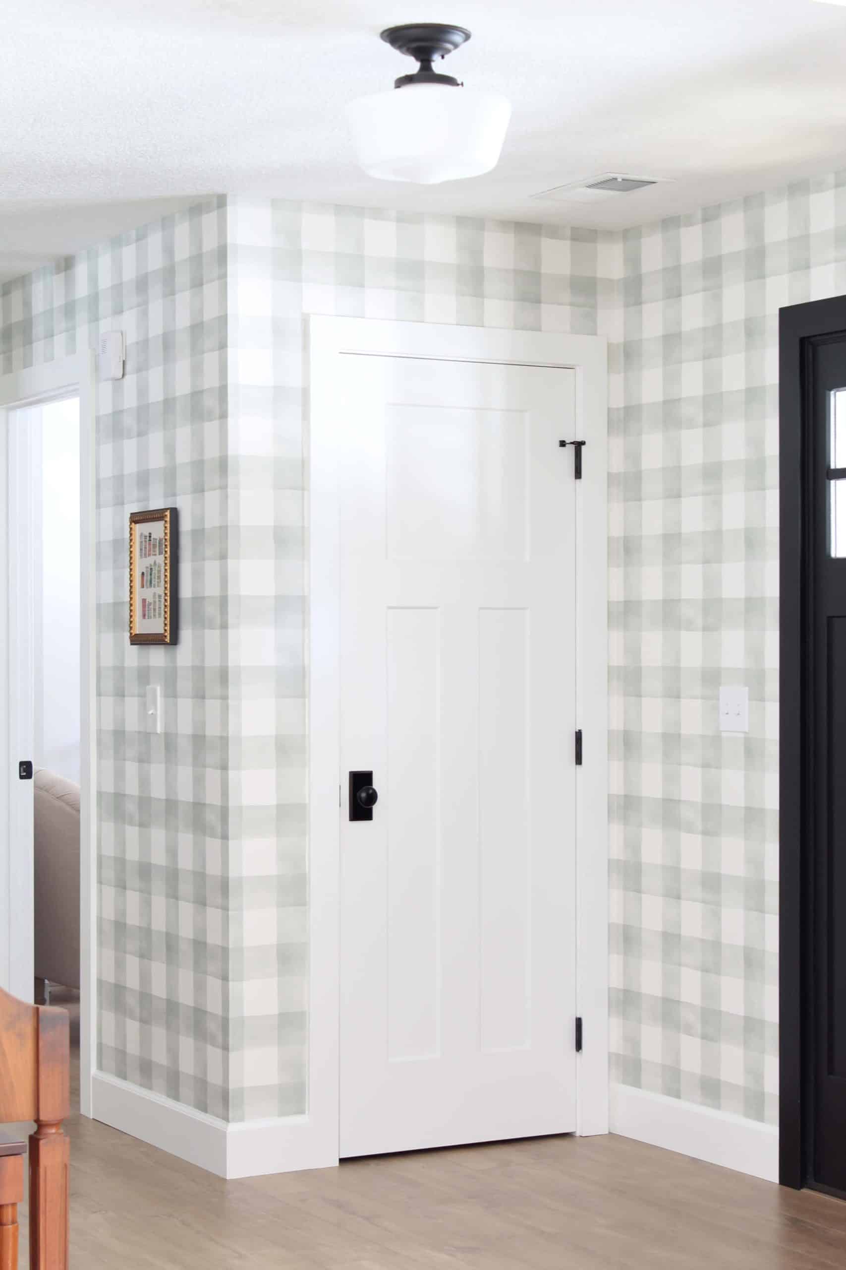 entryway with magnolia home watercolor check wallpaper