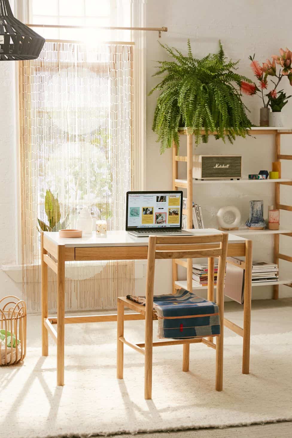 urban outfitters desk with large fern and marshall radio 