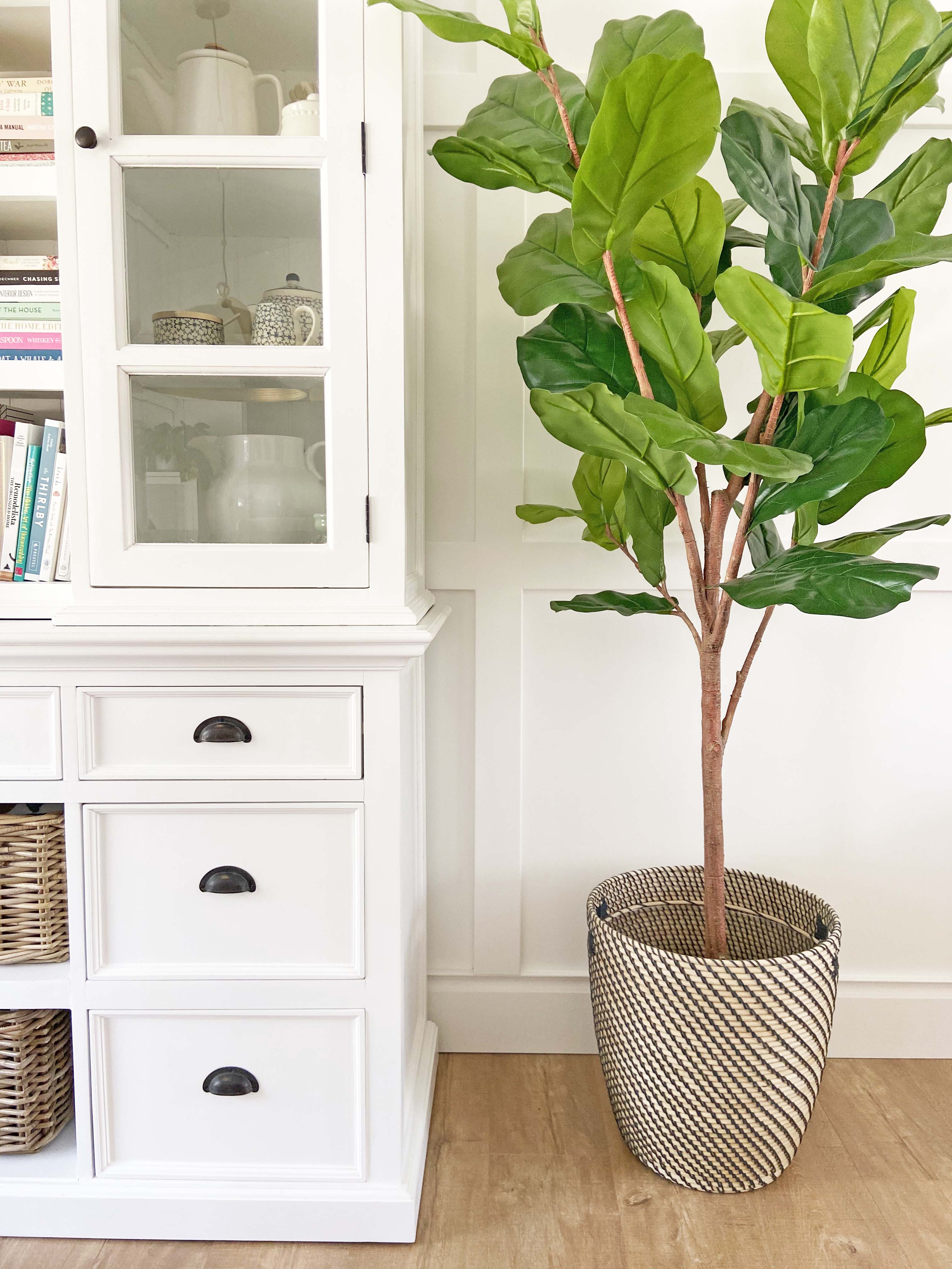 large faux fiddle leaf fig in ikea basket, large white cabinet hutch