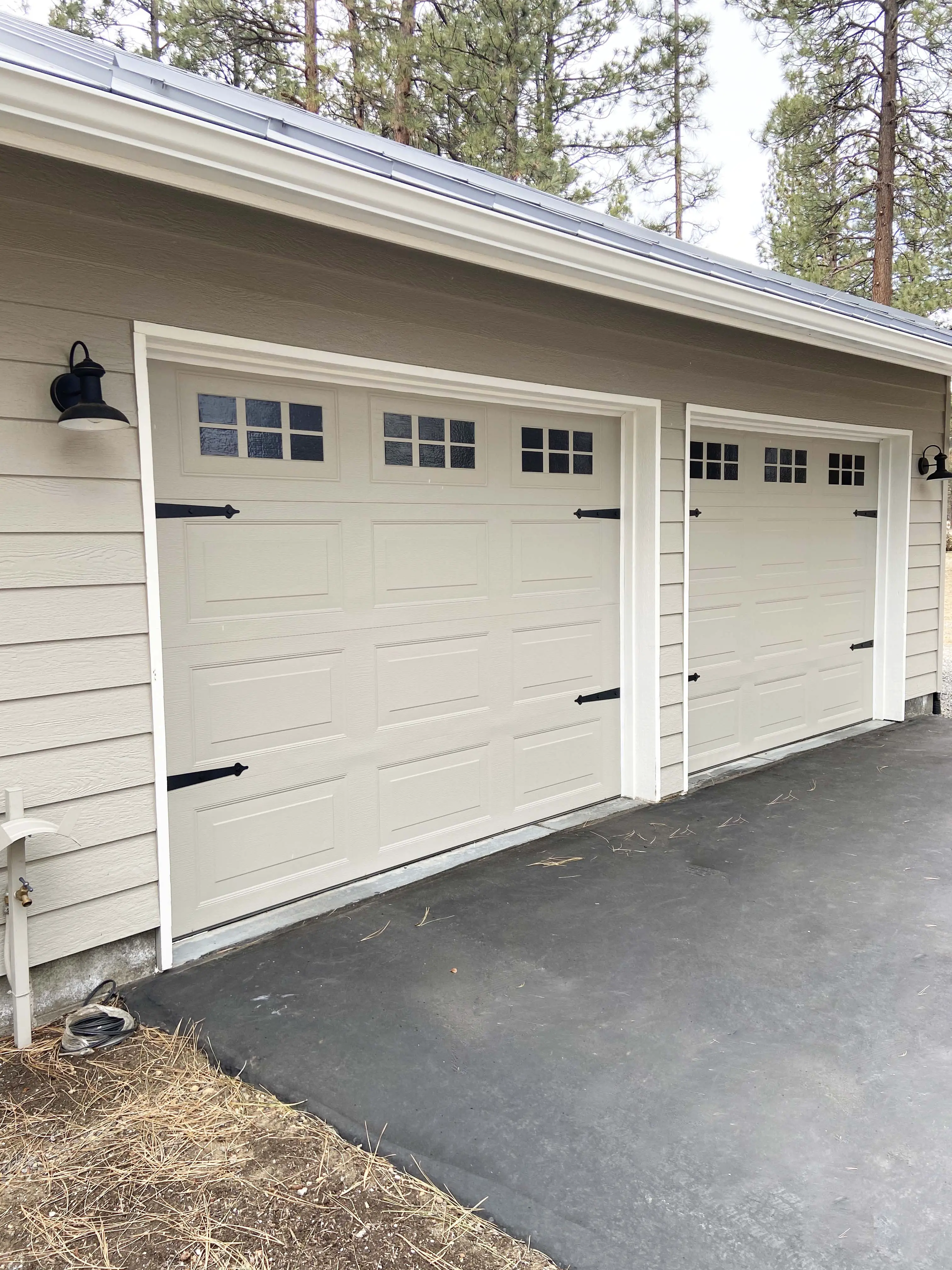 faux magnetic windows on gray garage door