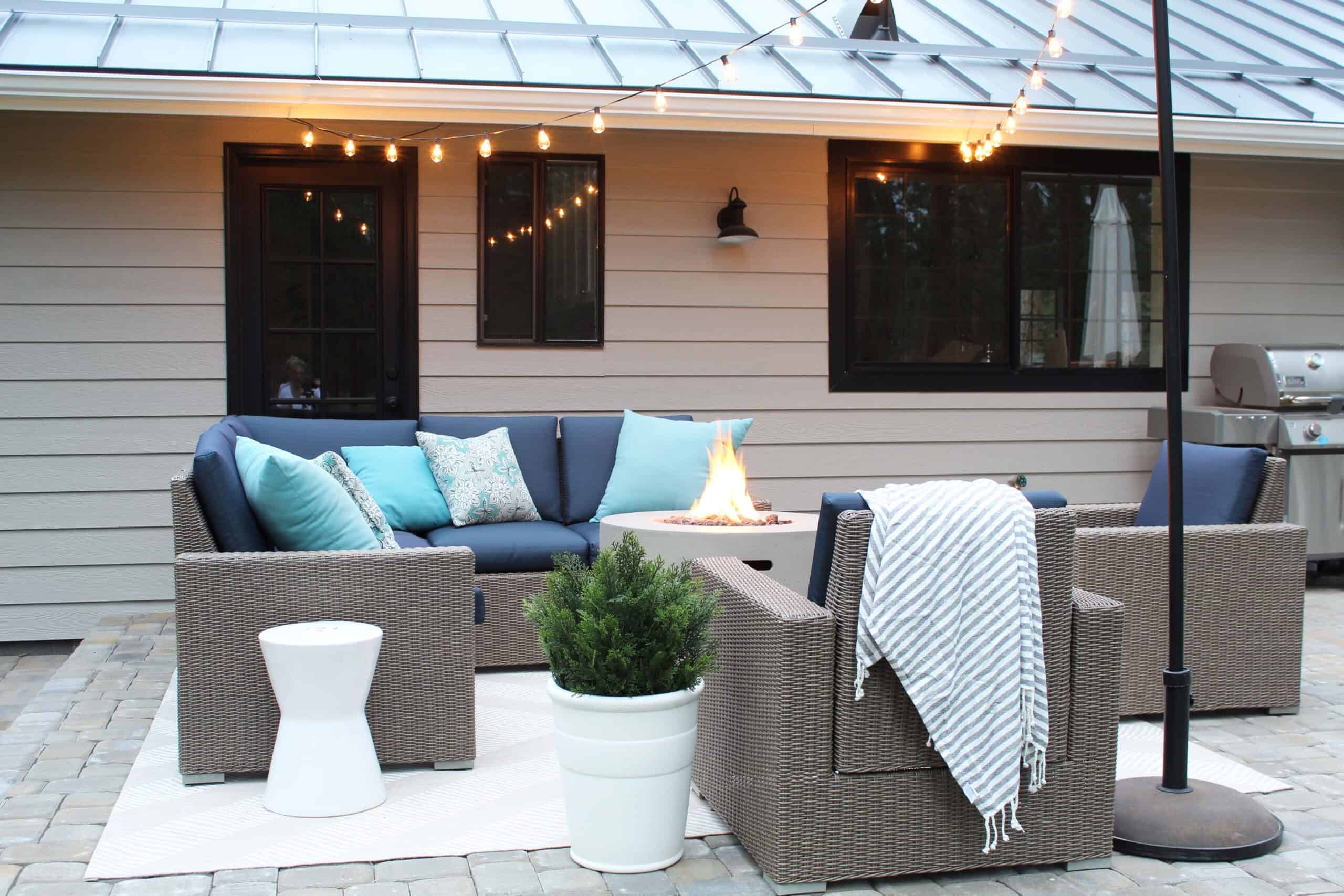 how to add string lights to your patio, target wicker outdoor furniture set, round cement fire pit