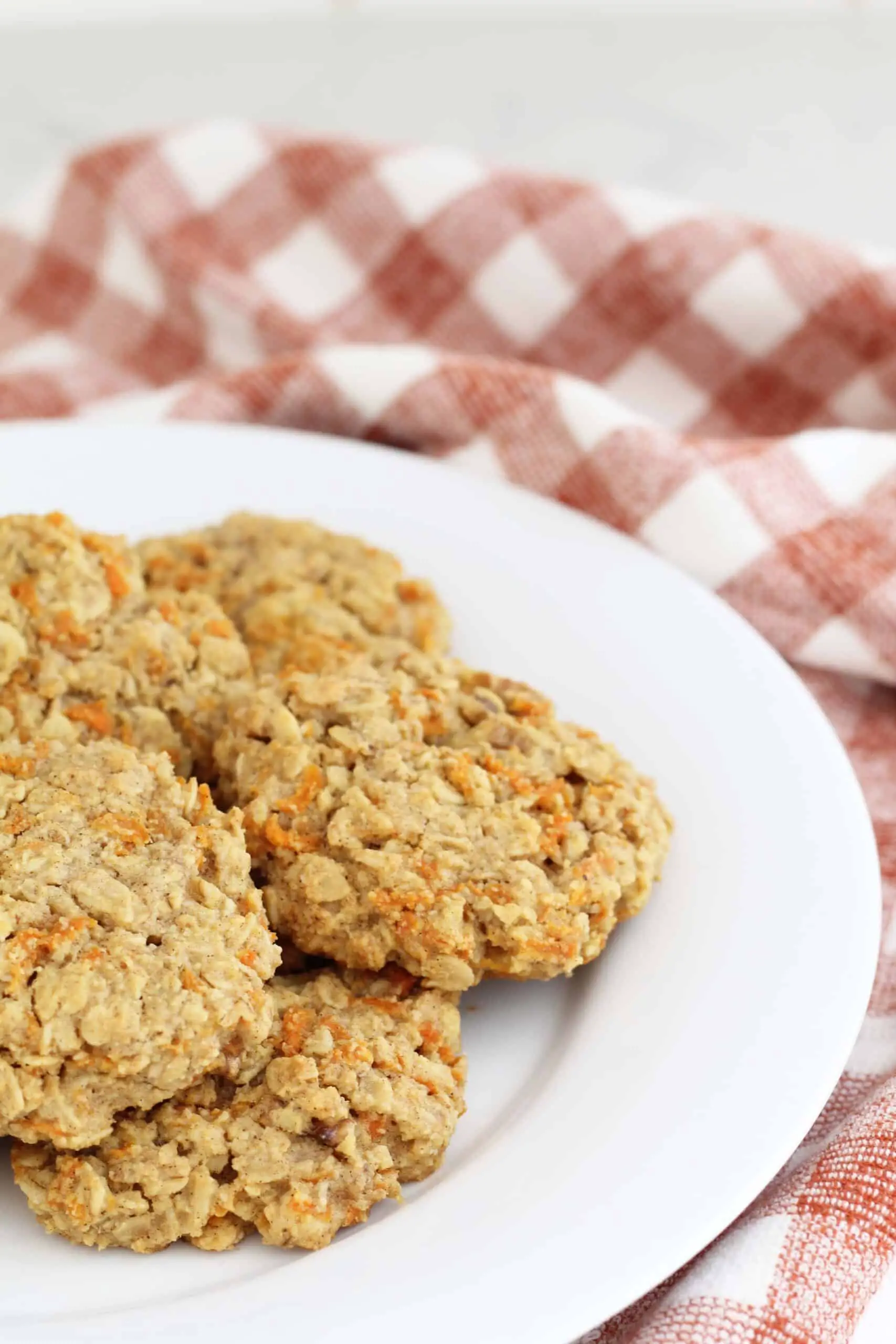 healthy carrot cake cookies with orange gingham hand towel 