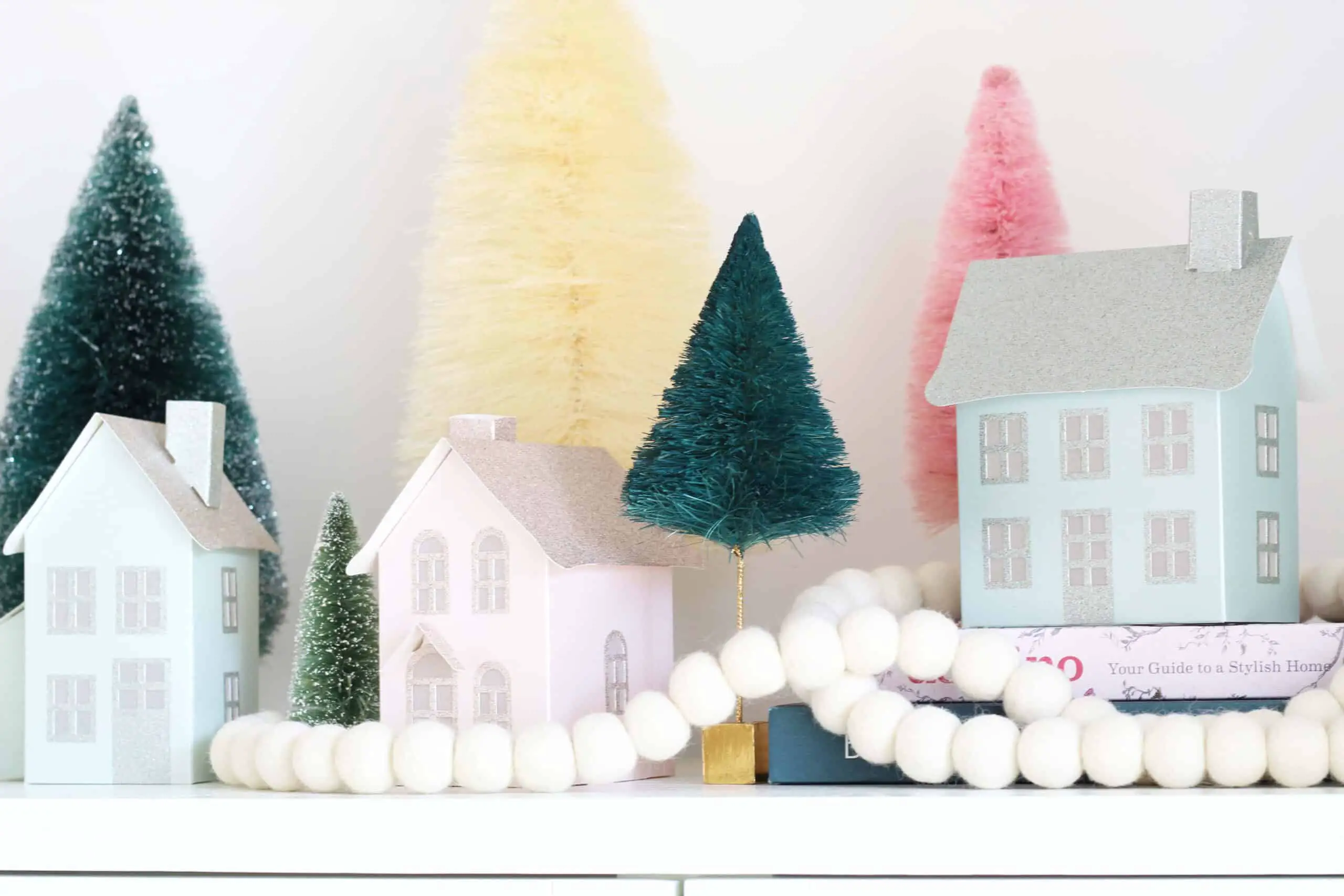 colorful bottle brush tree forest with putz houses